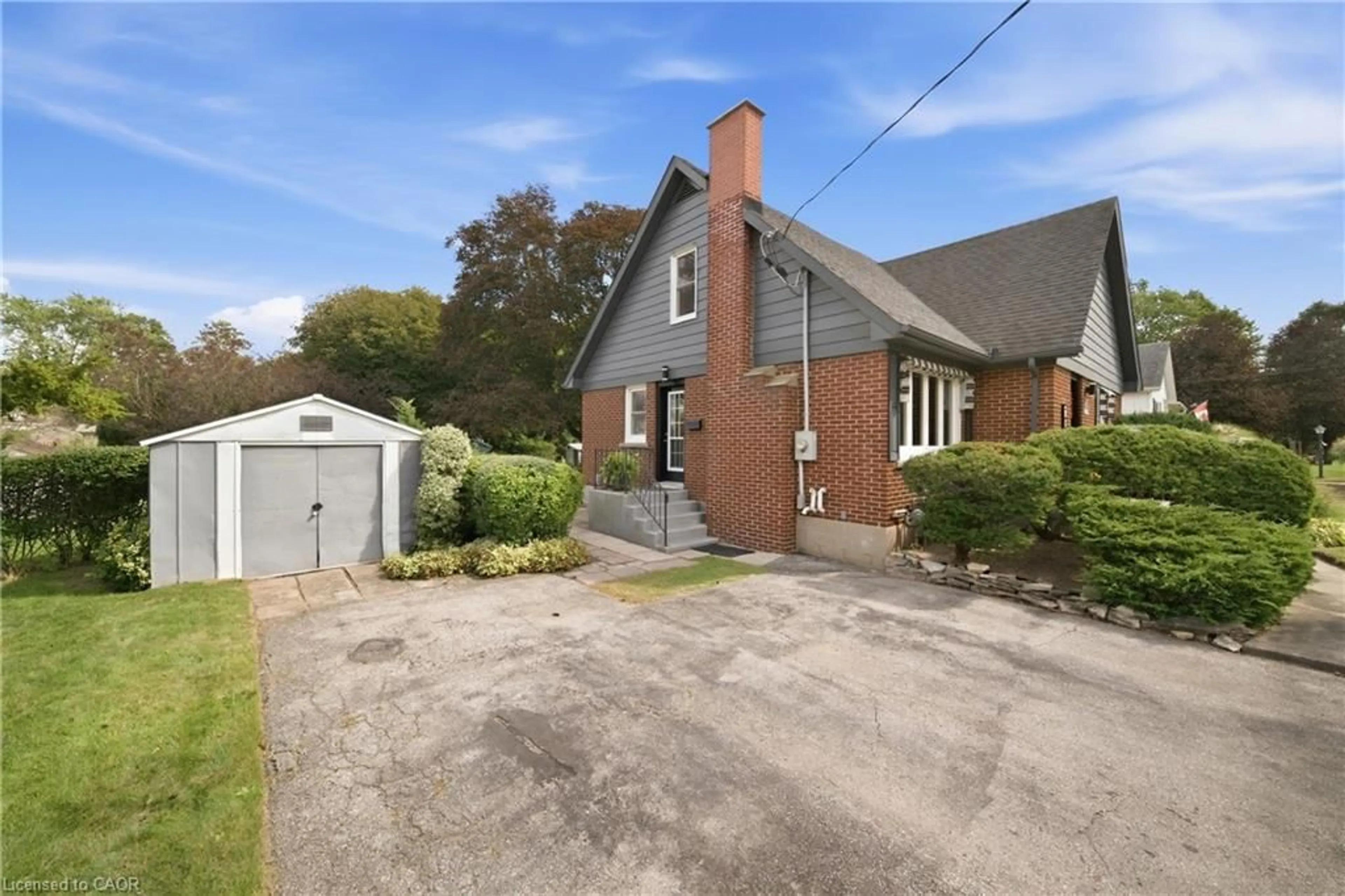 Home with brick exterior material, street for 33 The Strand Ave, Brantford Ontario N3R 1Z2