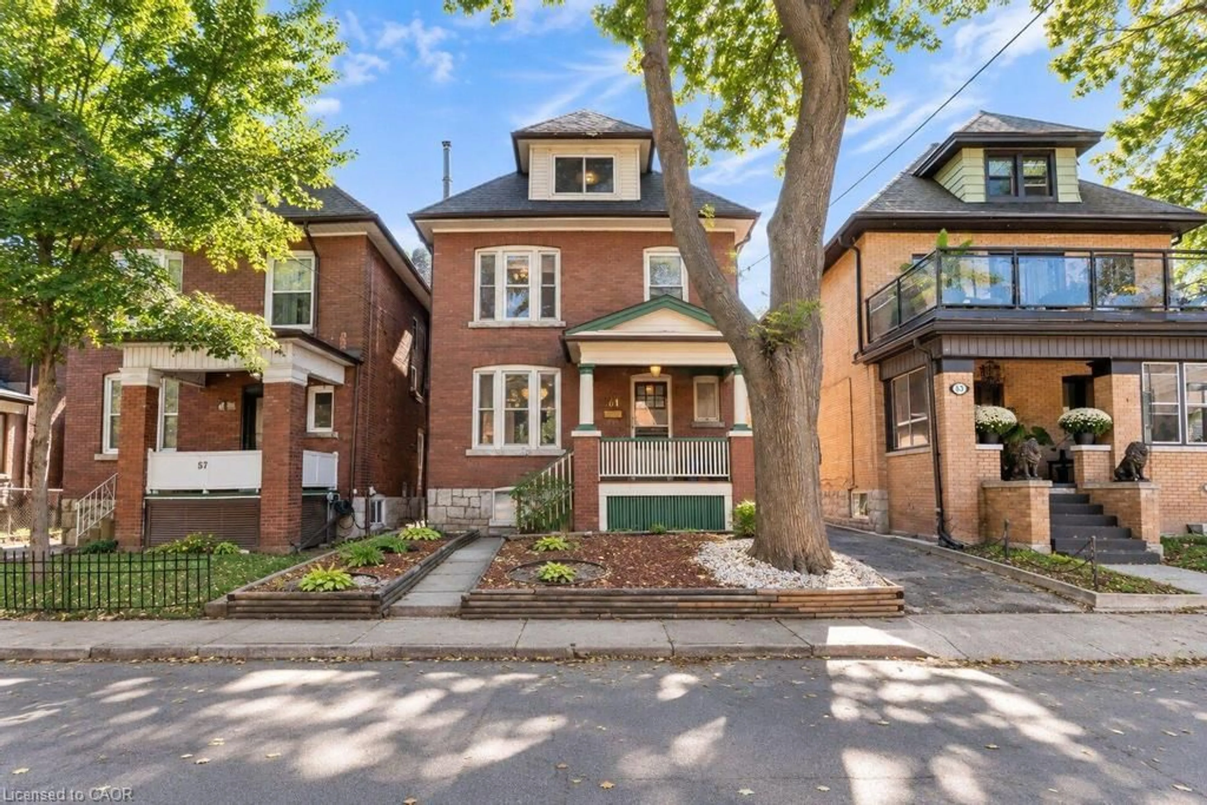 Home with brick exterior material, street for 61 Garfield Ave, Hamilton Ontario L8M 2R9