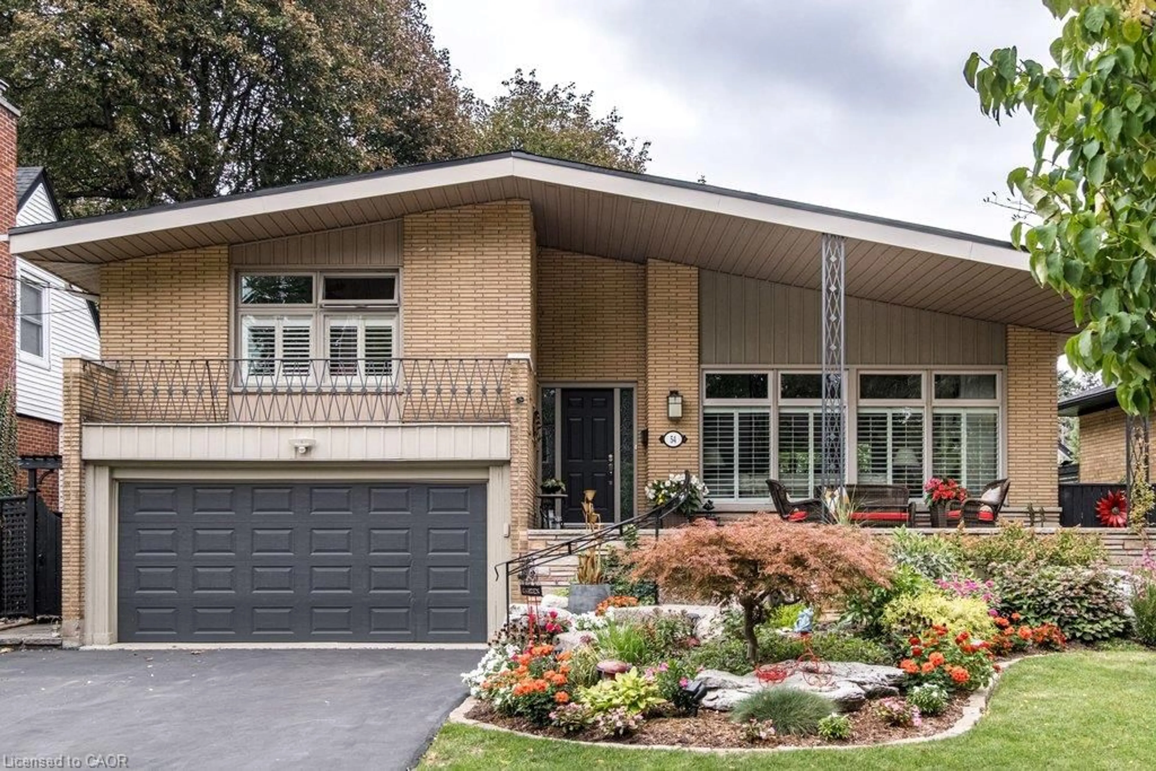 Home with brick exterior material, street for 54 Inverness Ave, Hamilton Ontario L9C 1A4