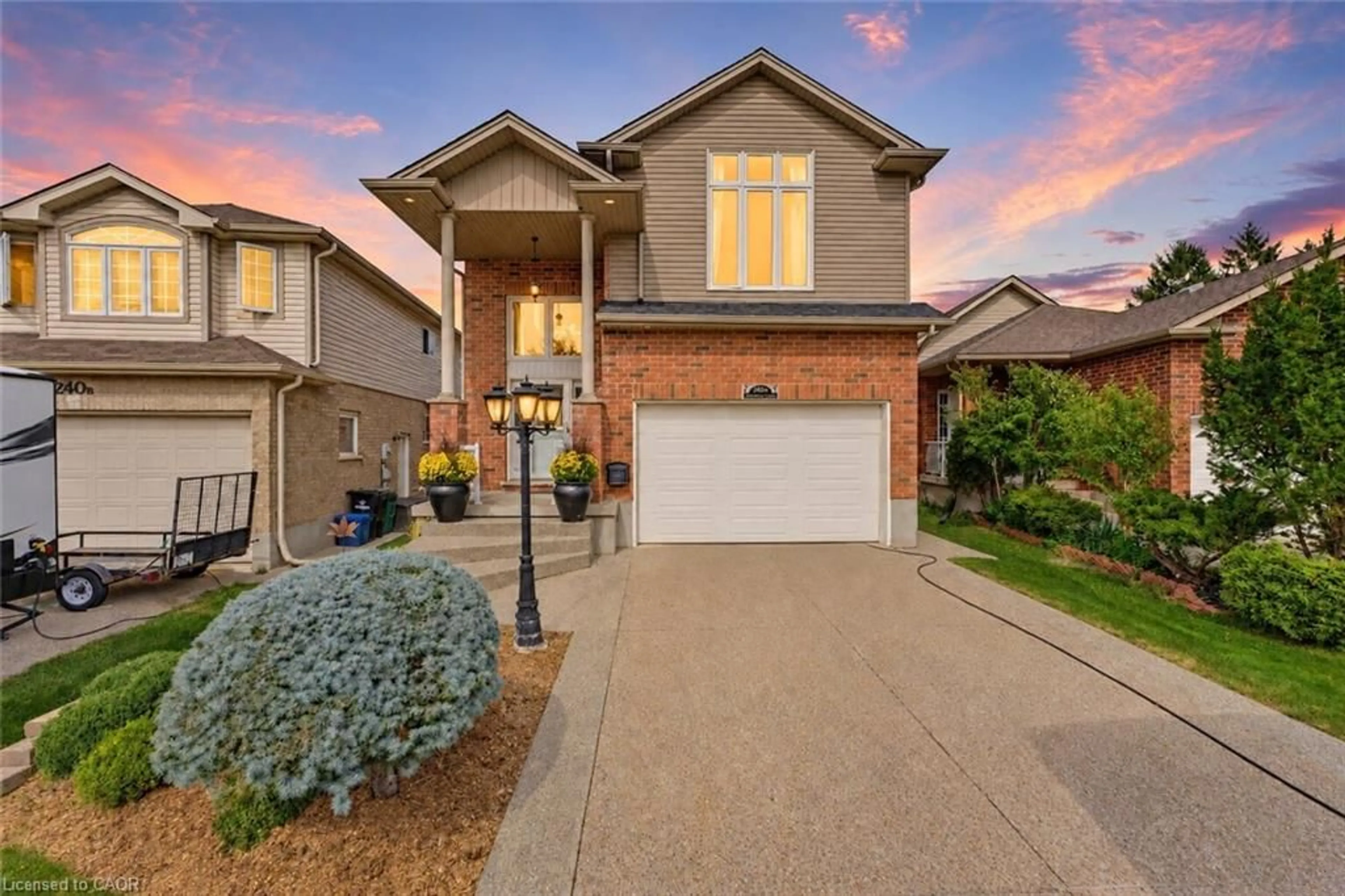 Home with brick exterior material, street for 240 Woodhaven Rd #A, Kitchener Ontario N2C 1V5
