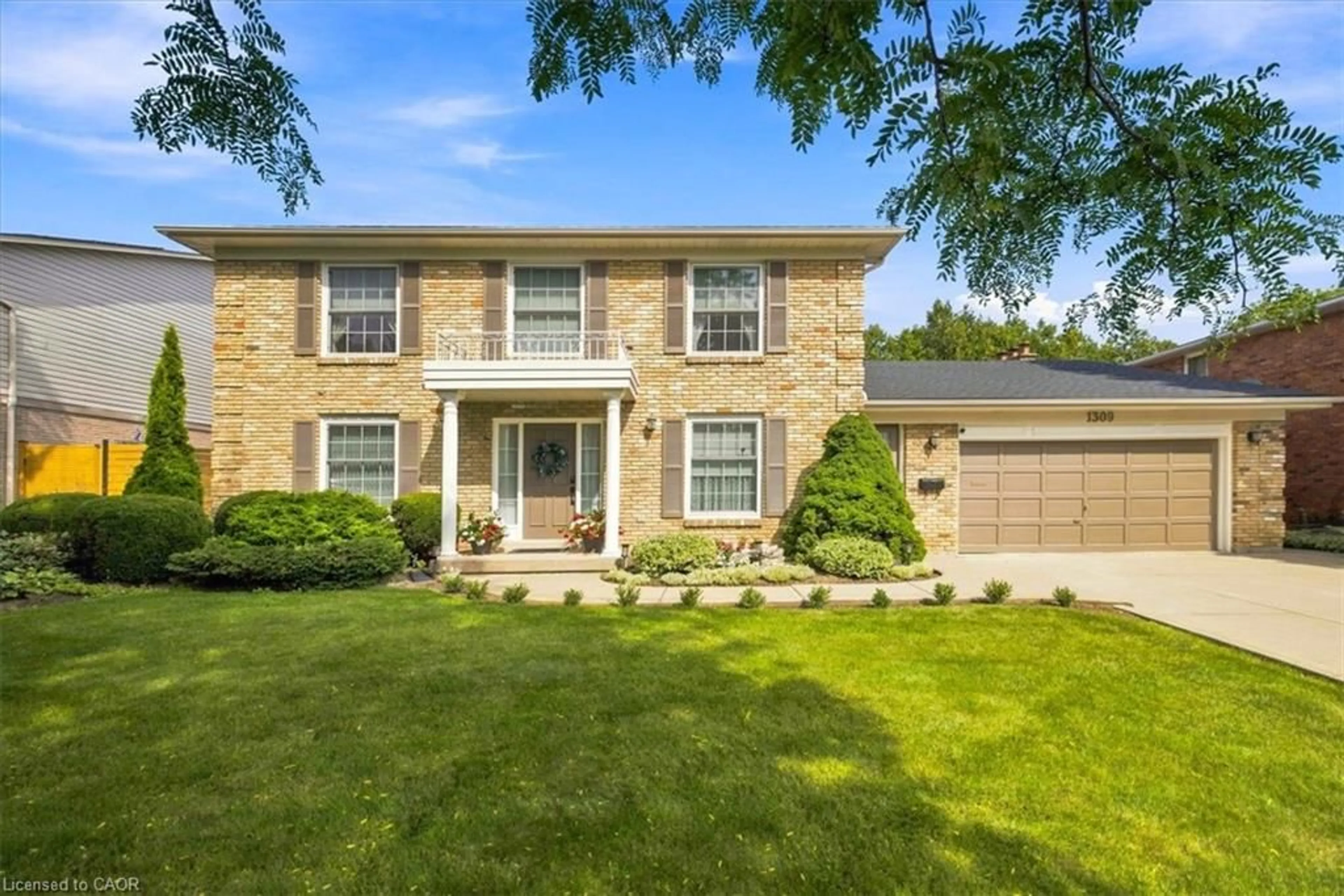 Home with brick exterior material, street for 1309 Monmouth Dr, Burlington Ontario L7P 3N4