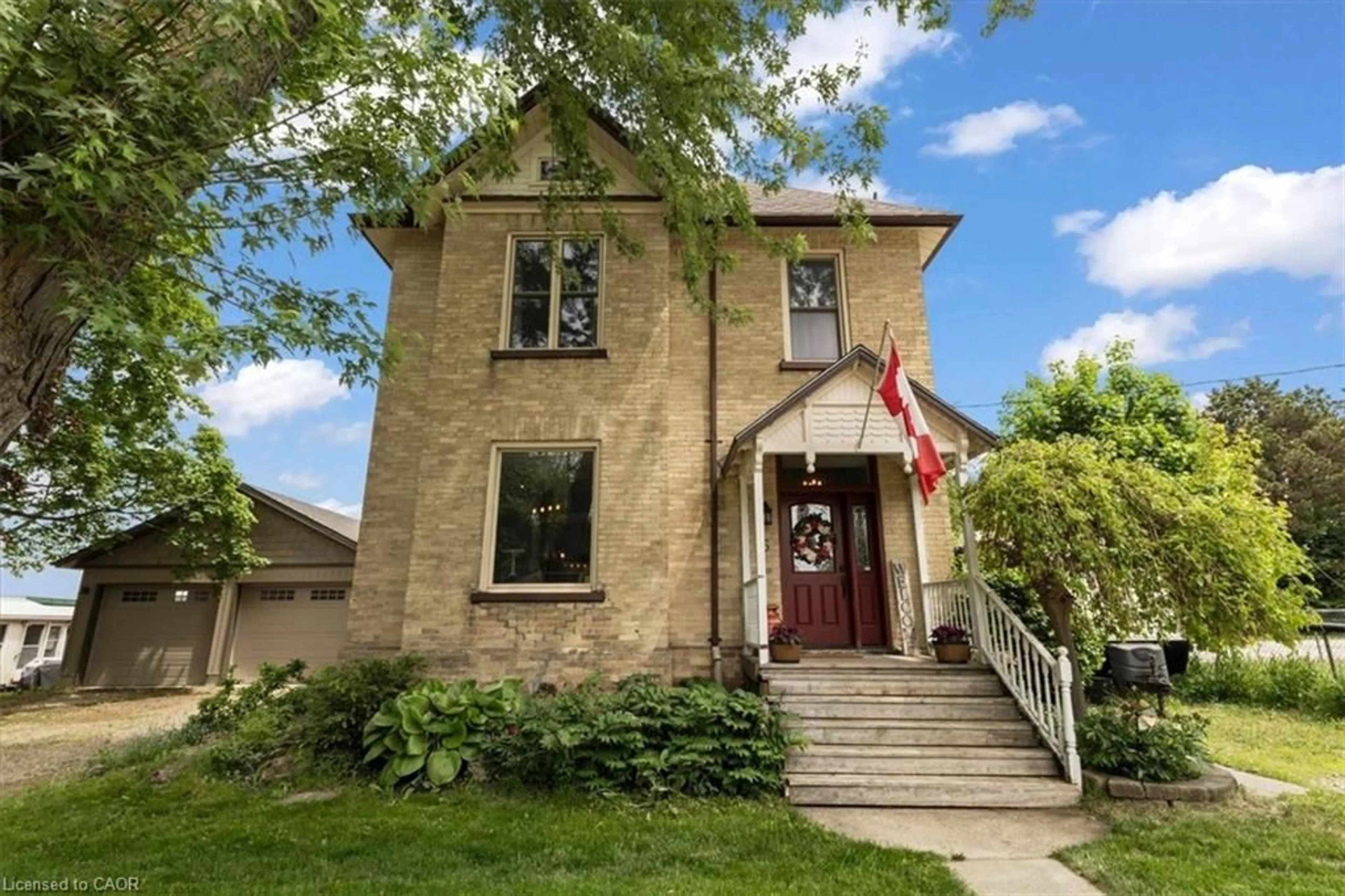 Home with brick exterior material, street for 95 John St, Harriston Ontario N0G 1Z0