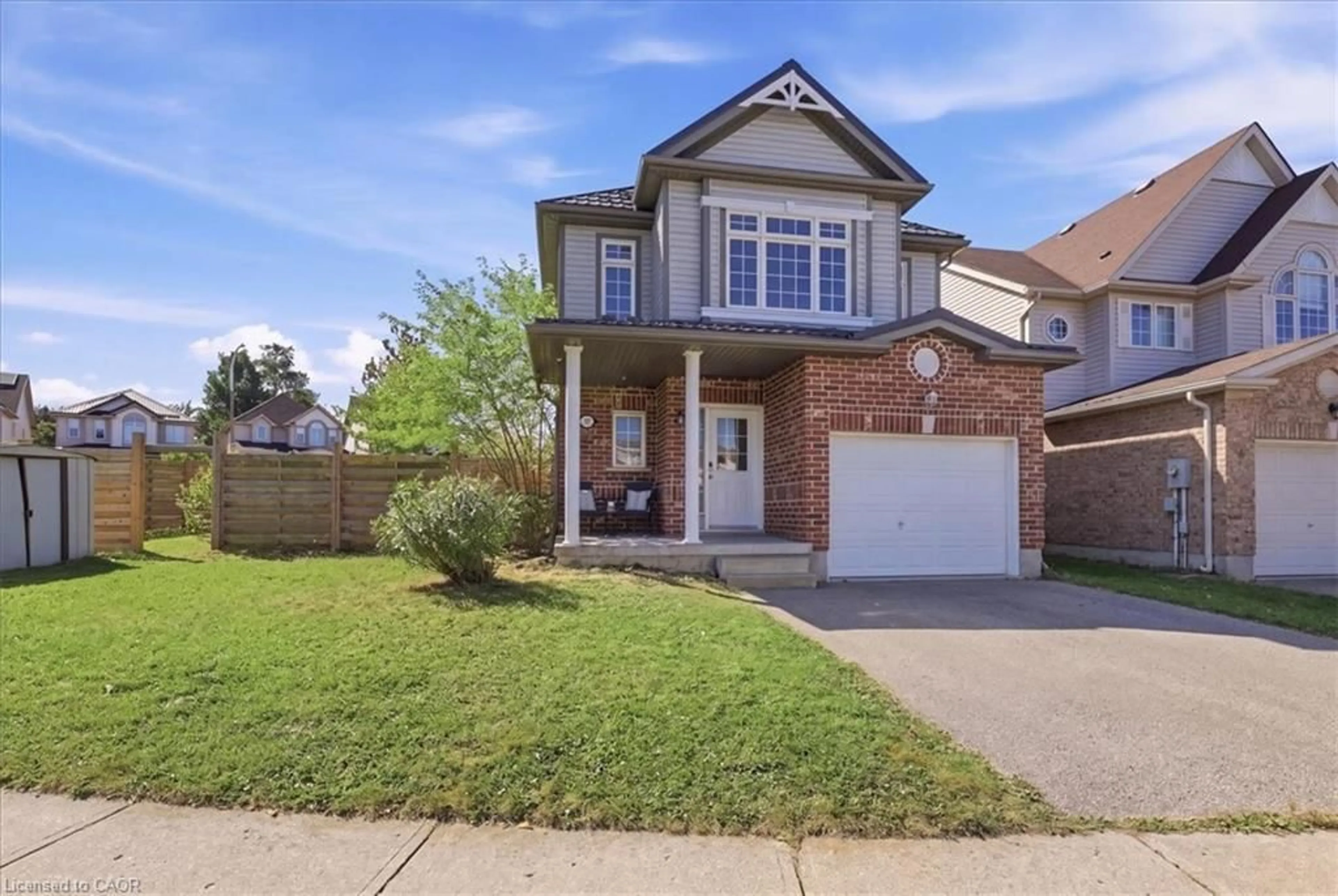 Home with brick exterior material, street for 430 Mountain Laurel Cres, Kitchener Ontario N2E 4B4