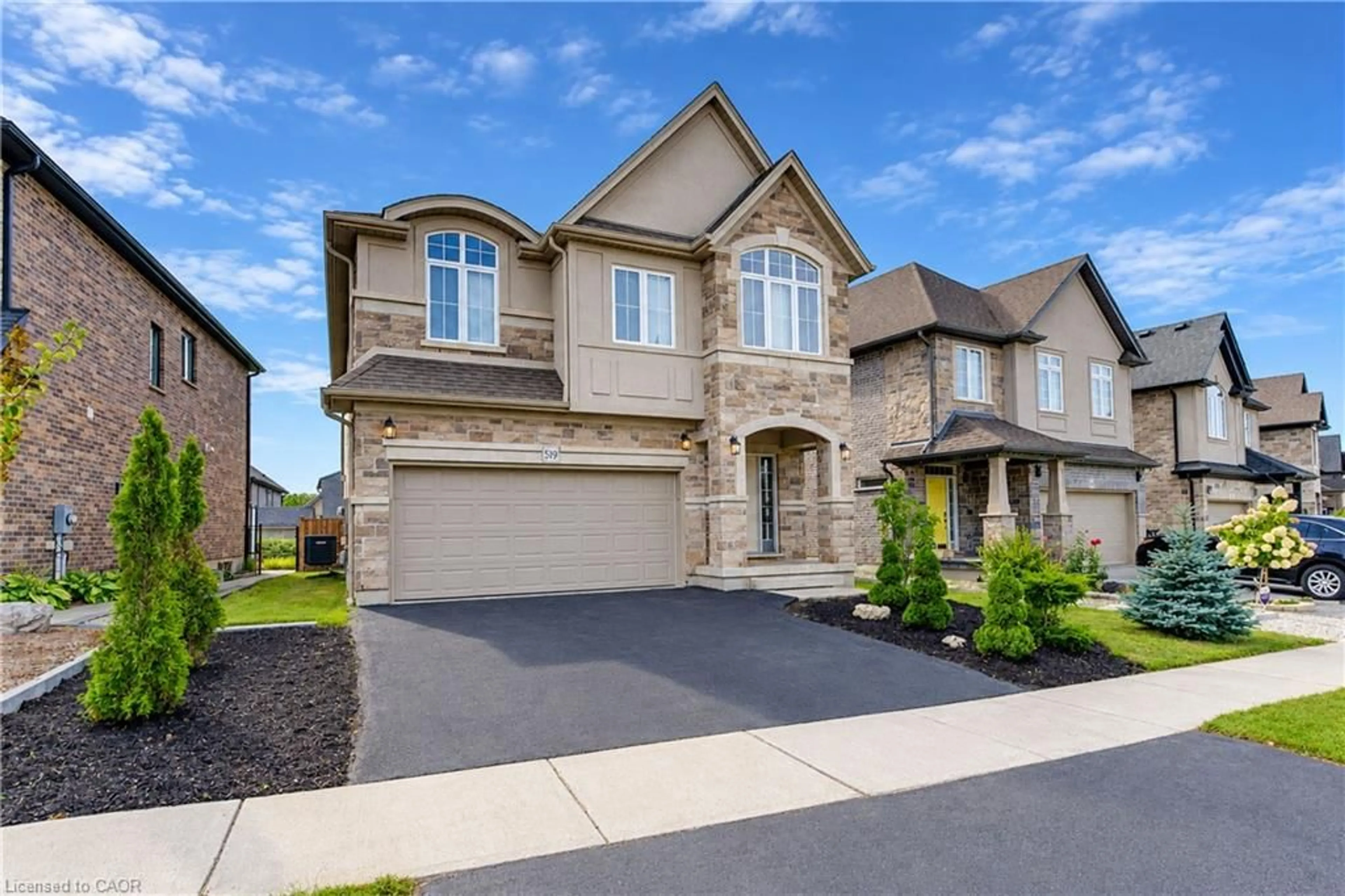 Home with brick exterior material, street for 519 Gristmill St, Waterloo Ontario N2K 0C9