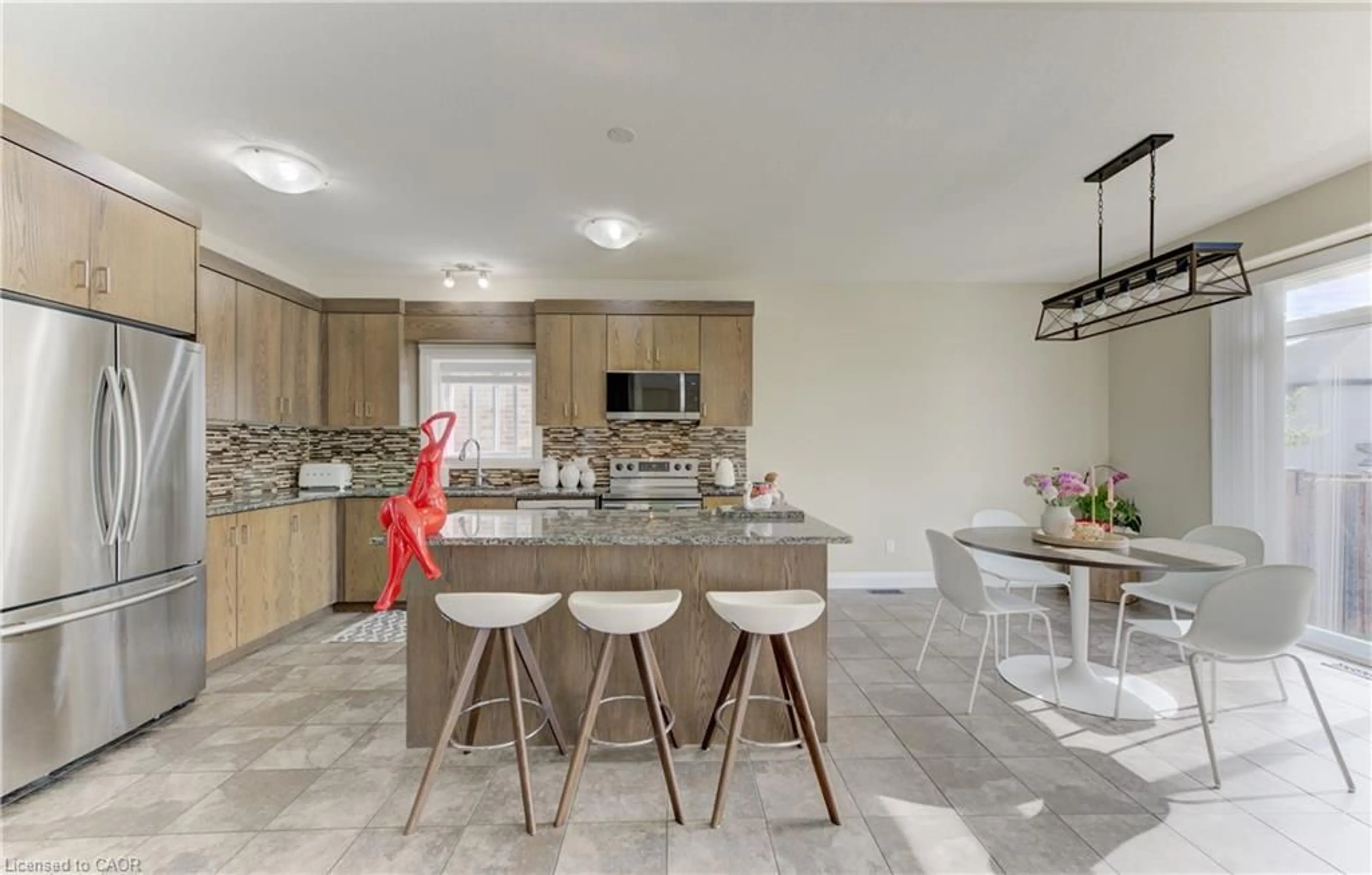 Open concept kitchen, ceramic/tile floor for 519 Gristmill St, Waterloo Ontario N2K 0C9