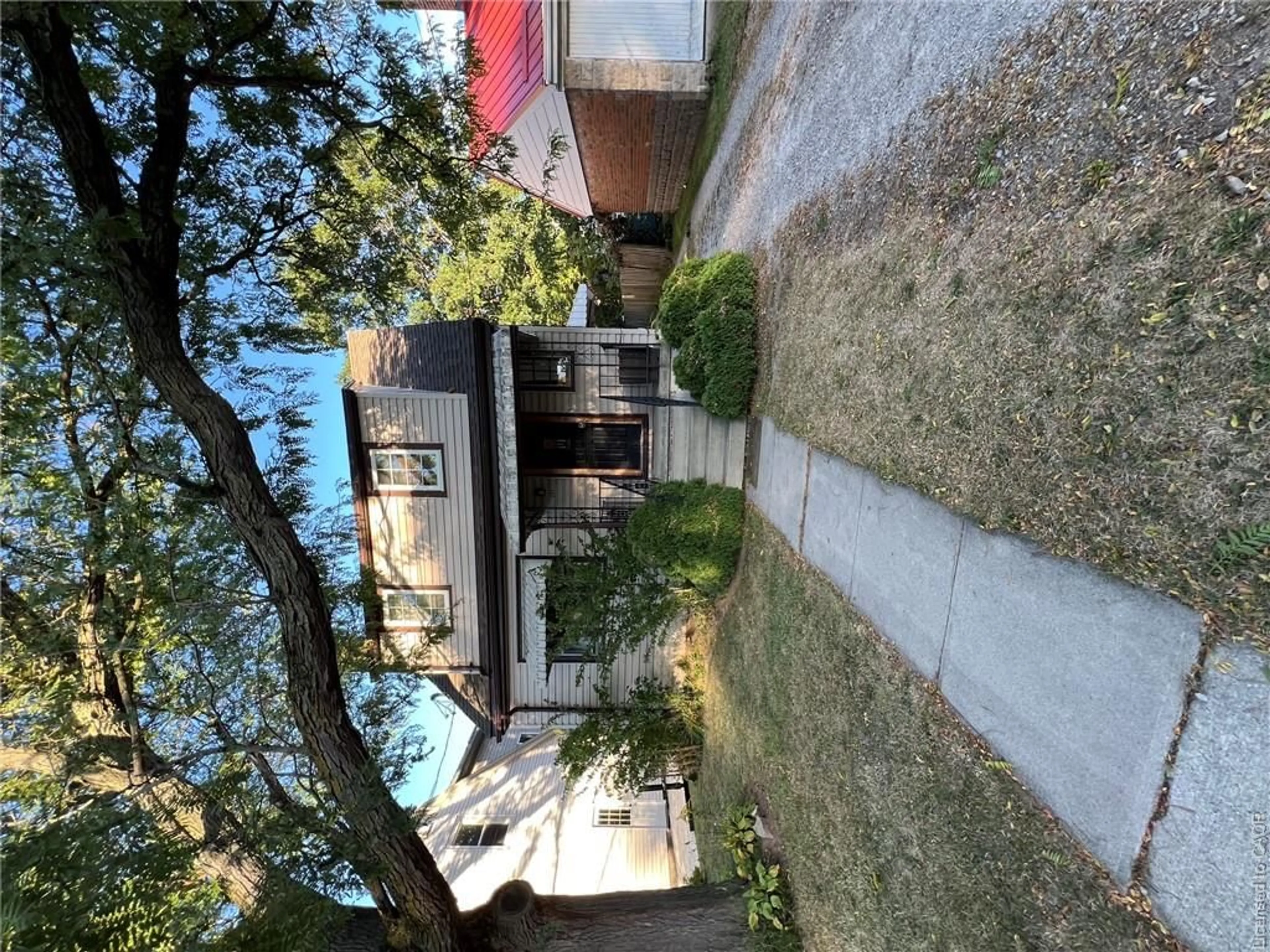 A pic from outside/outdoor area/front of a property/back of a property/a pic from drone, street for 131 Emerson St, Hamilton Ontario L8S 2X7