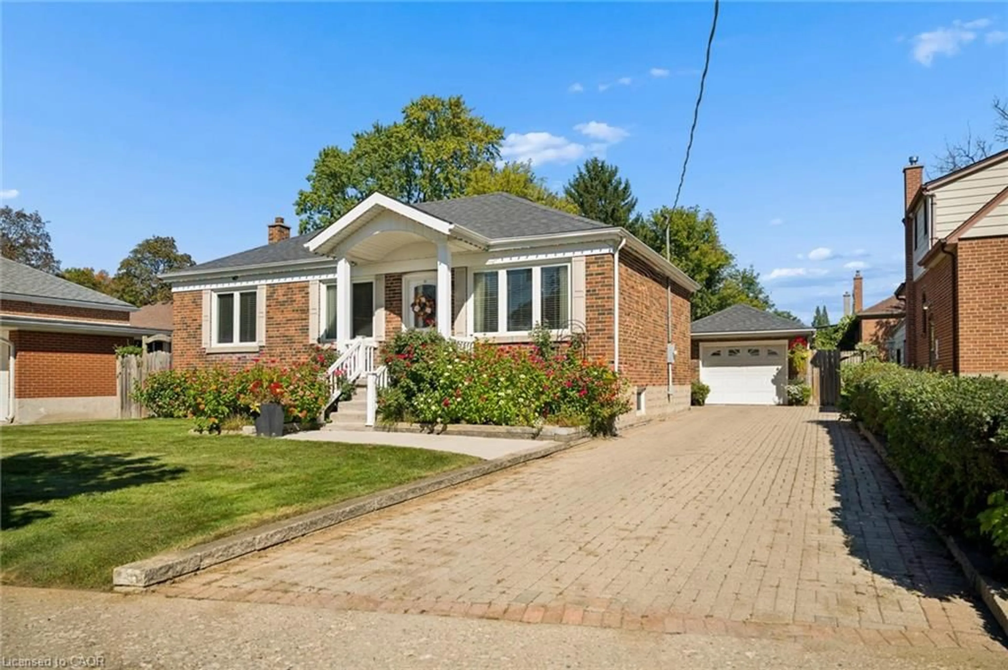 Home with brick exterior material, street for 56 Suffolk Ave, Kitchener Ontario N2B 1H5