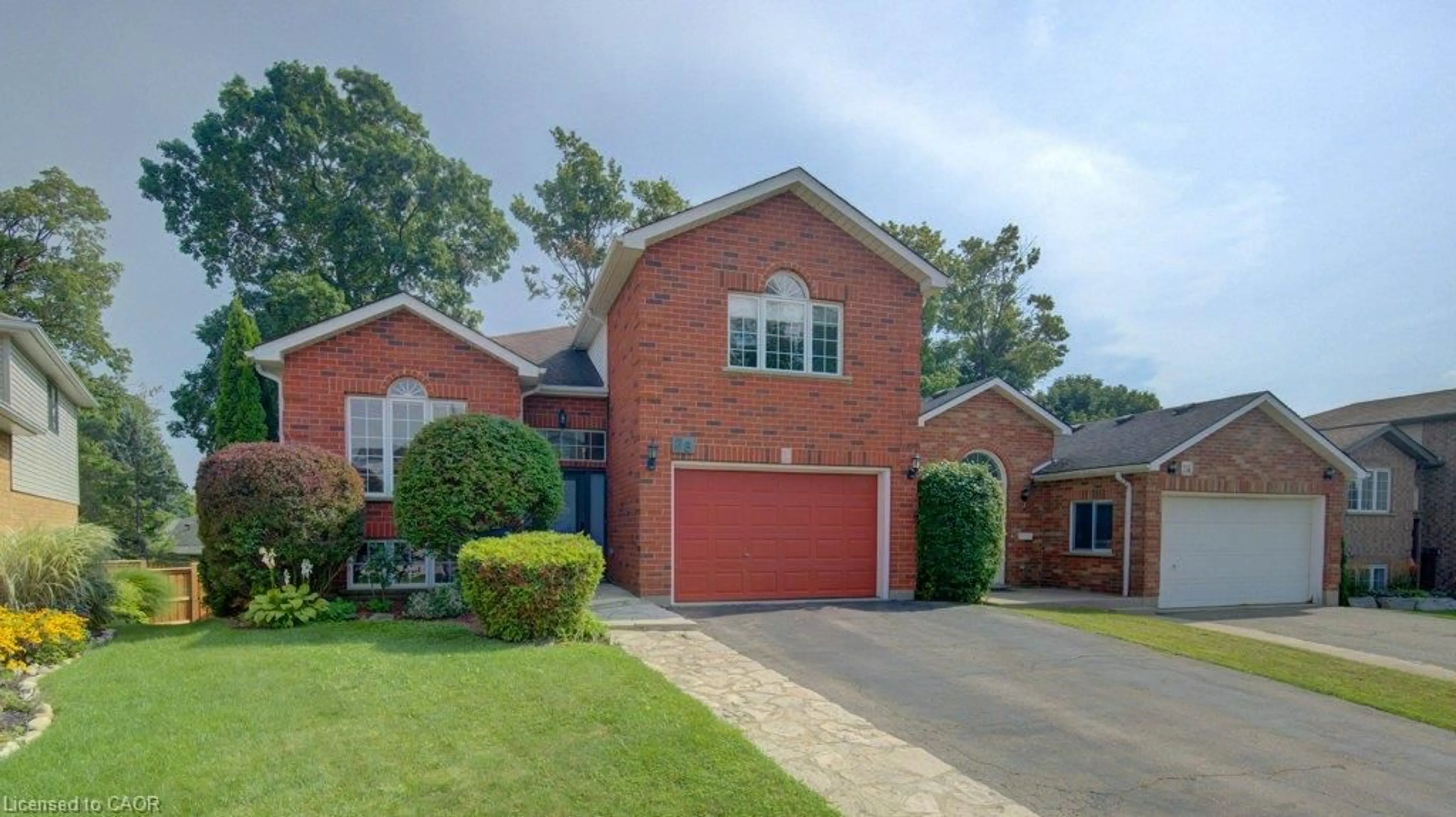 Home with brick exterior material, street for 26 Stanmore Ave, Kitchener Ontario N2B 3W2