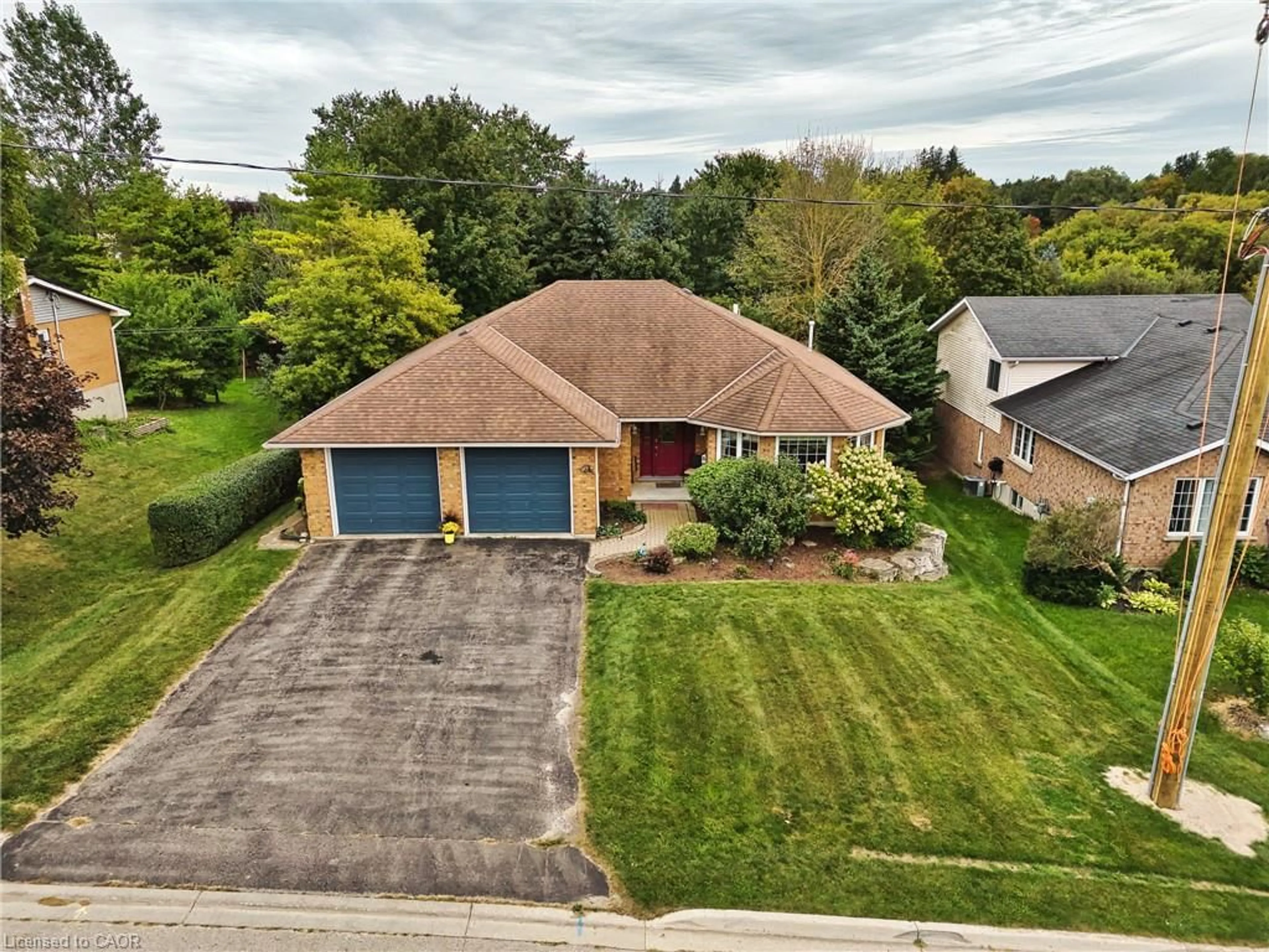 A pic from outside/outdoor area/front of a property/back of a property/a pic from drone, street for 21 Drayton Queen St, Drayton Ontario N0G 1P0