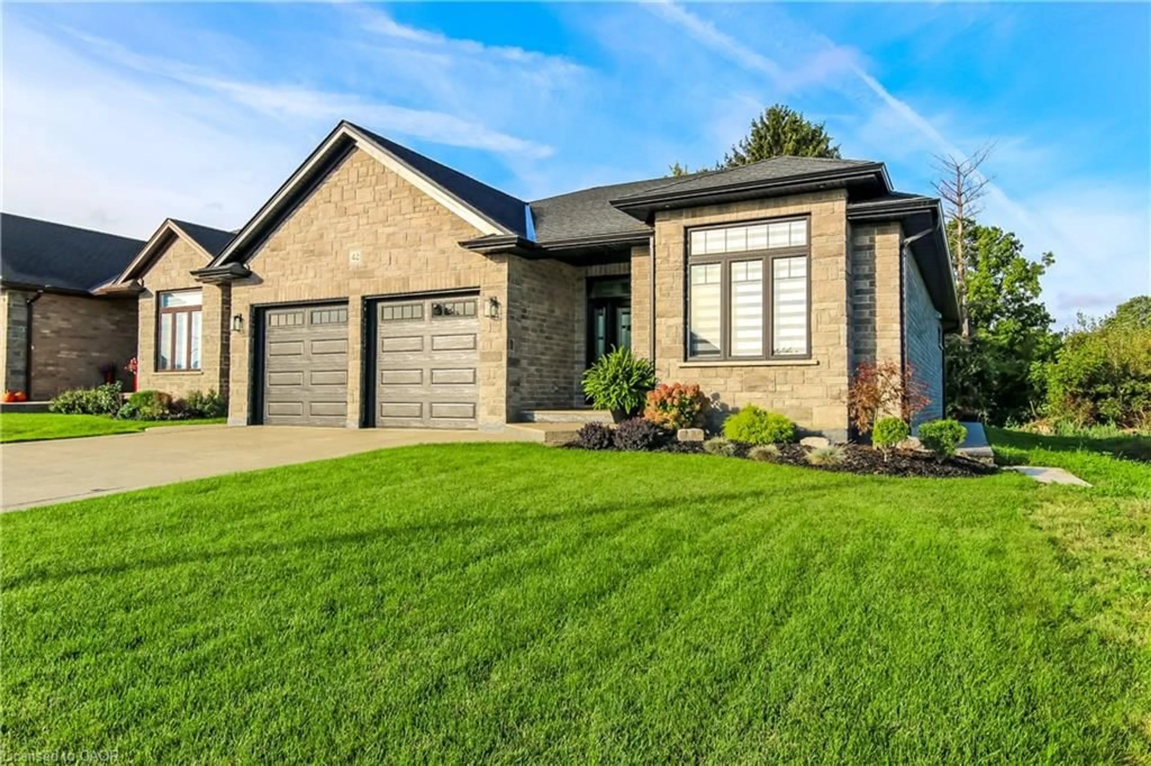 Home with brick exterior material, street for 42 Judd Dr, Simcoe Ontario N3Y 0G7