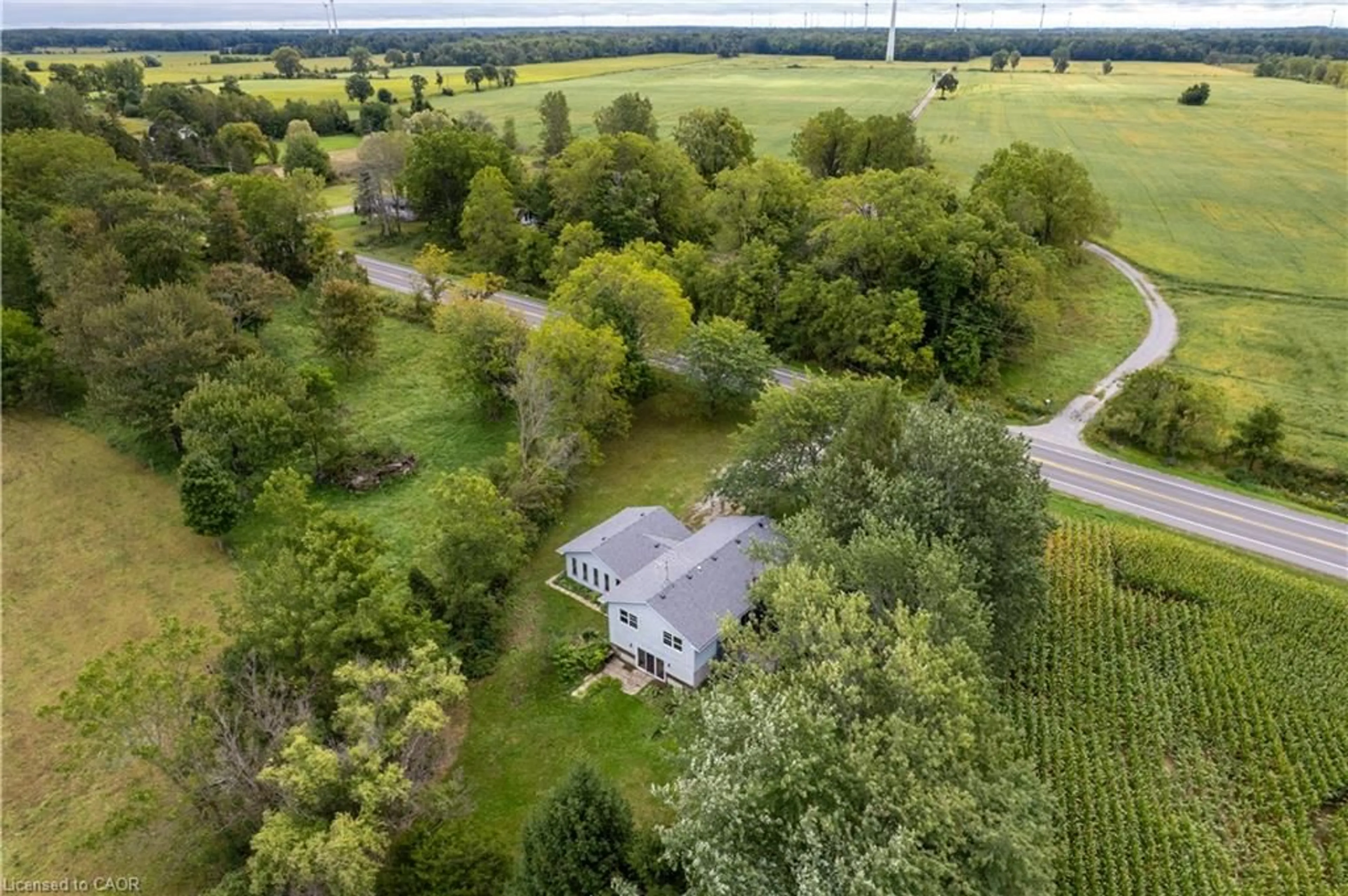 A pic from outside/outdoor area/front of a property/back of a property/a pic from drone, water/lake/river/ocean view for 1919 Highway 3, Dunnville Ontario N1A 2W7