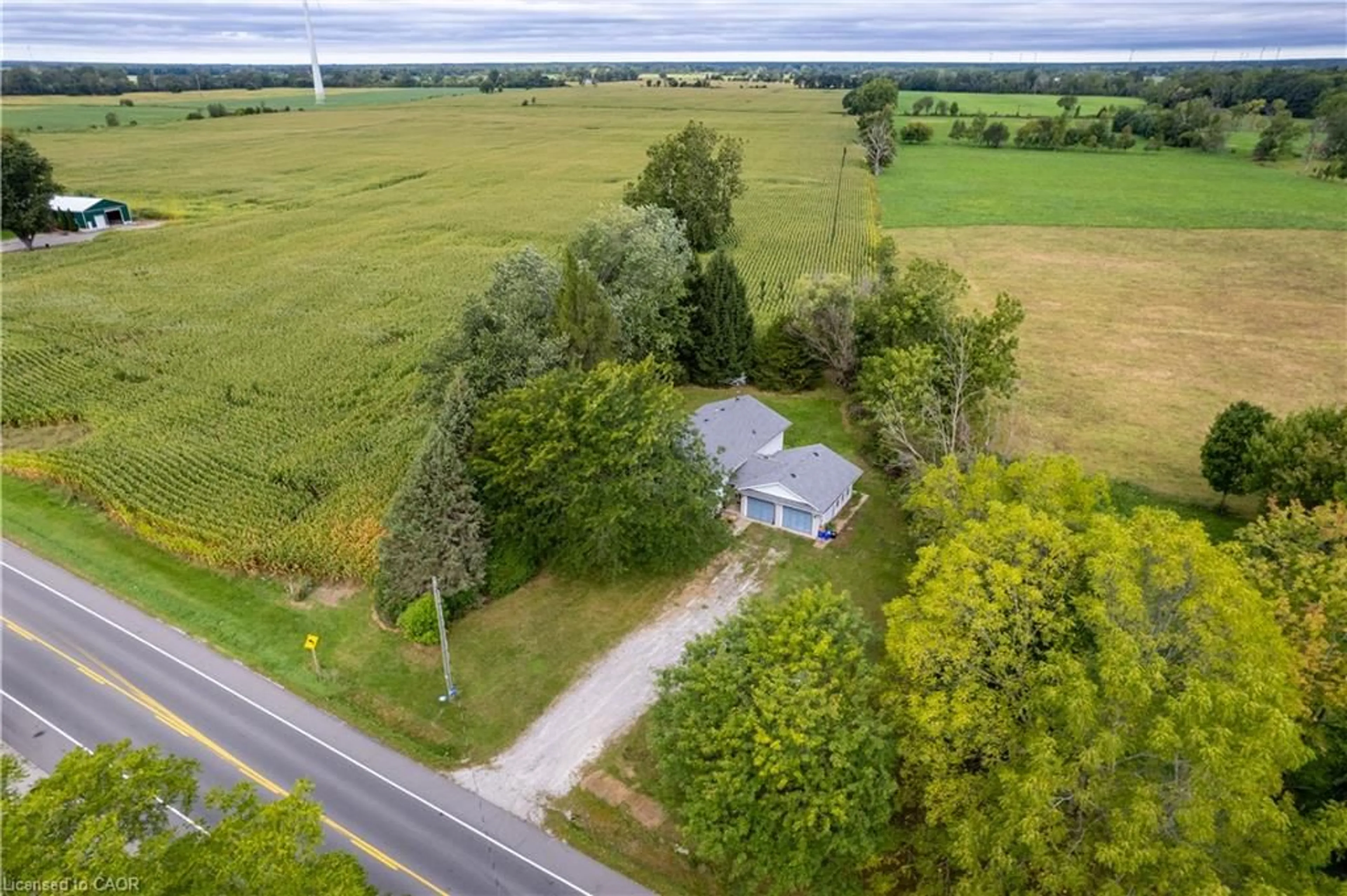 A pic from outside/outdoor area/front of a property/back of a property/a pic from drone, street for 1919 Highway 3, Dunnville Ontario N1A 2W7