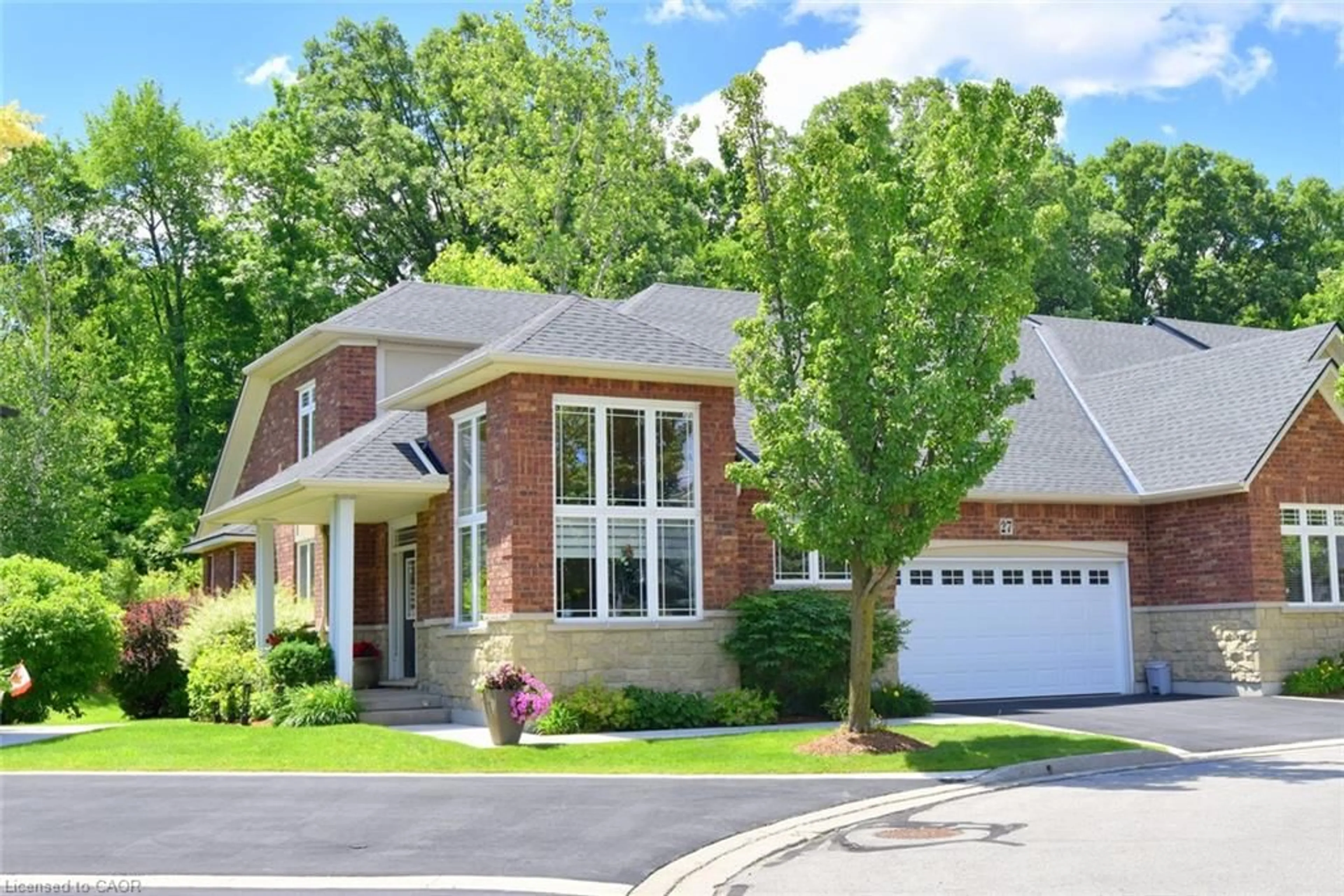 Home with brick exterior material, street for 27 Landscapes Trail, Ancaster Ontario L9K 0A1