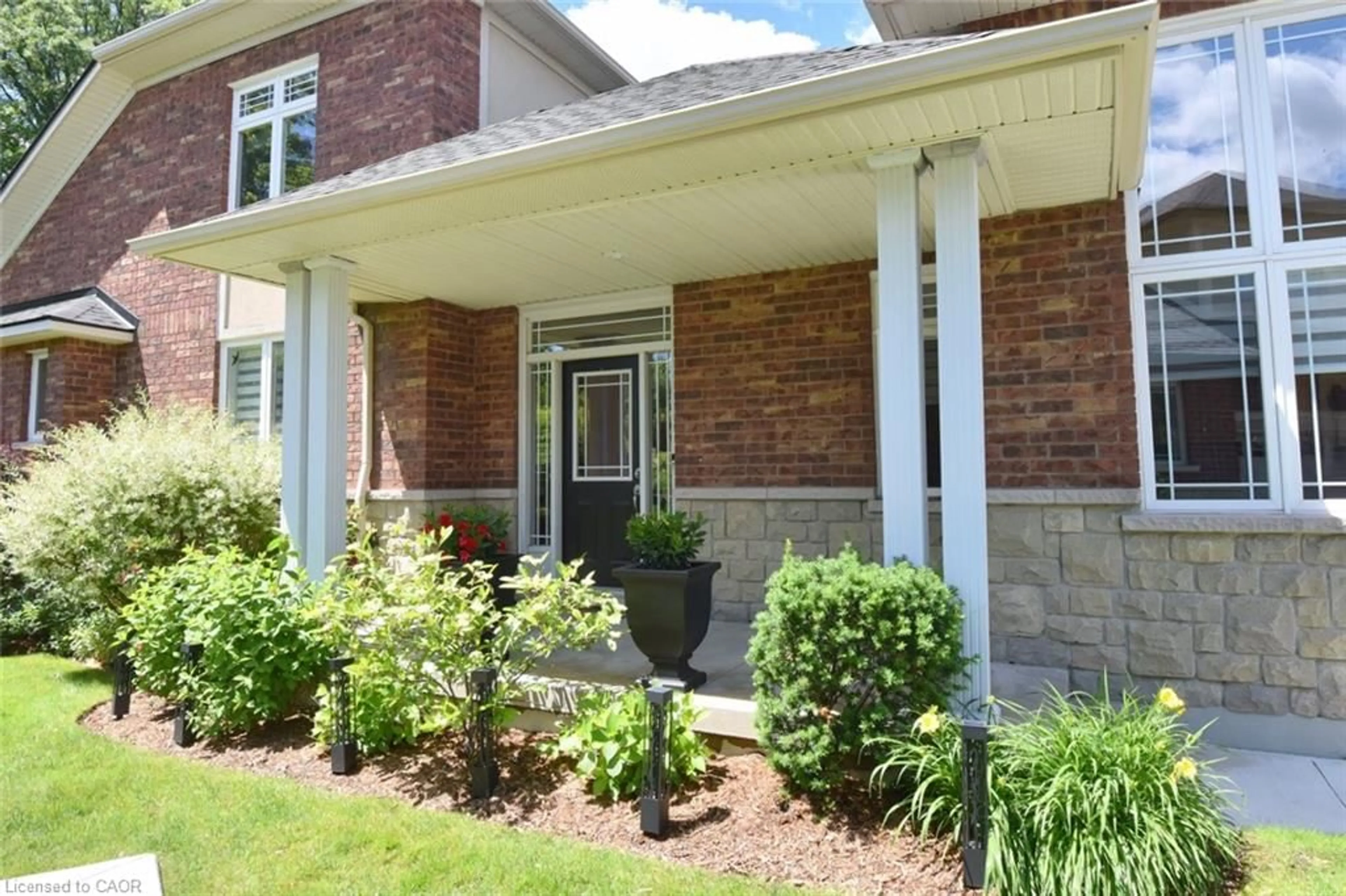 Home with brick exterior material, street for 27 Landscapes Trail, Ancaster Ontario L9K 0A1