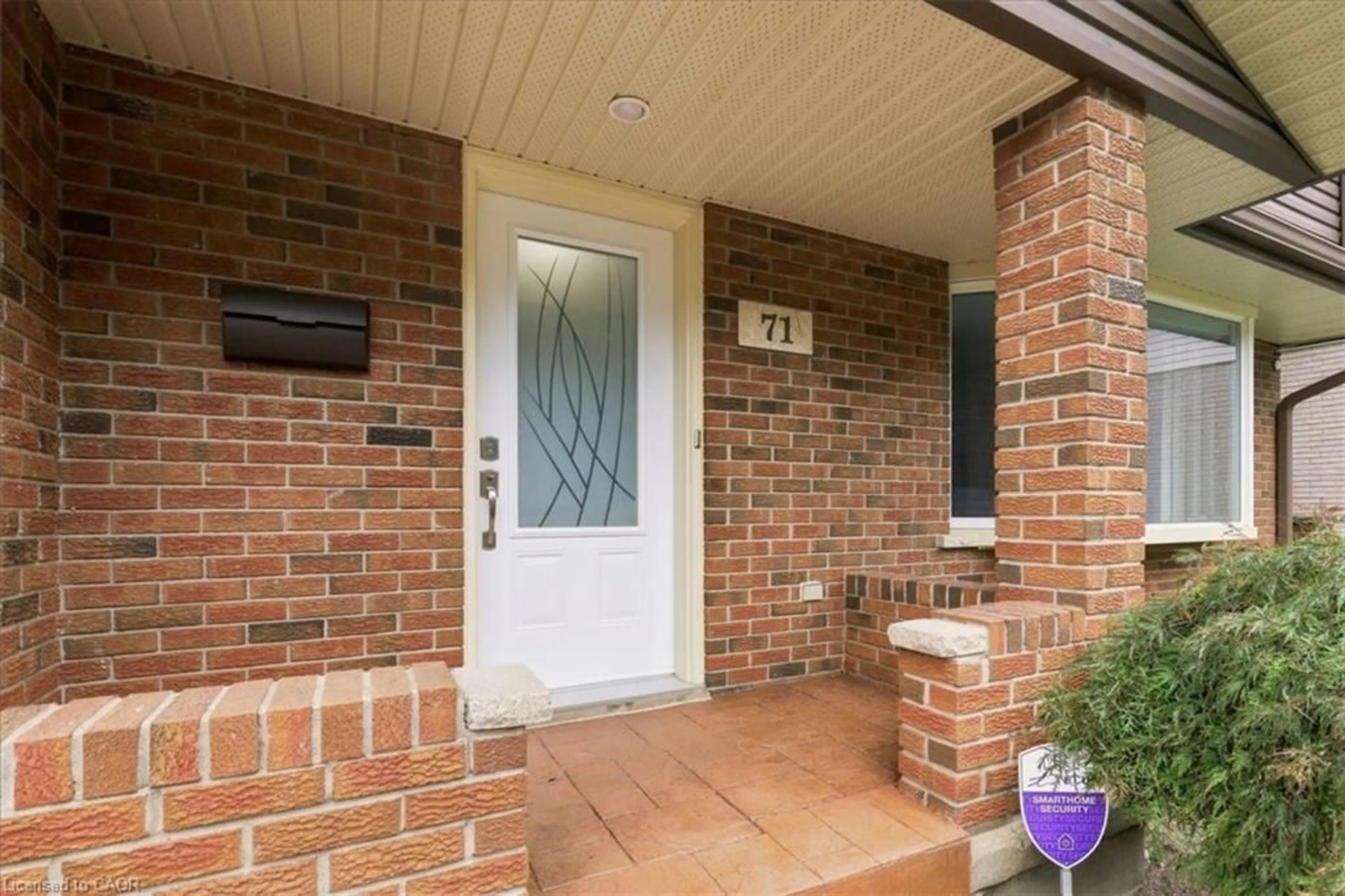 Home with brick exterior material, street for 71 Greenock Dr, Kitchener Ontario N2E 2J9