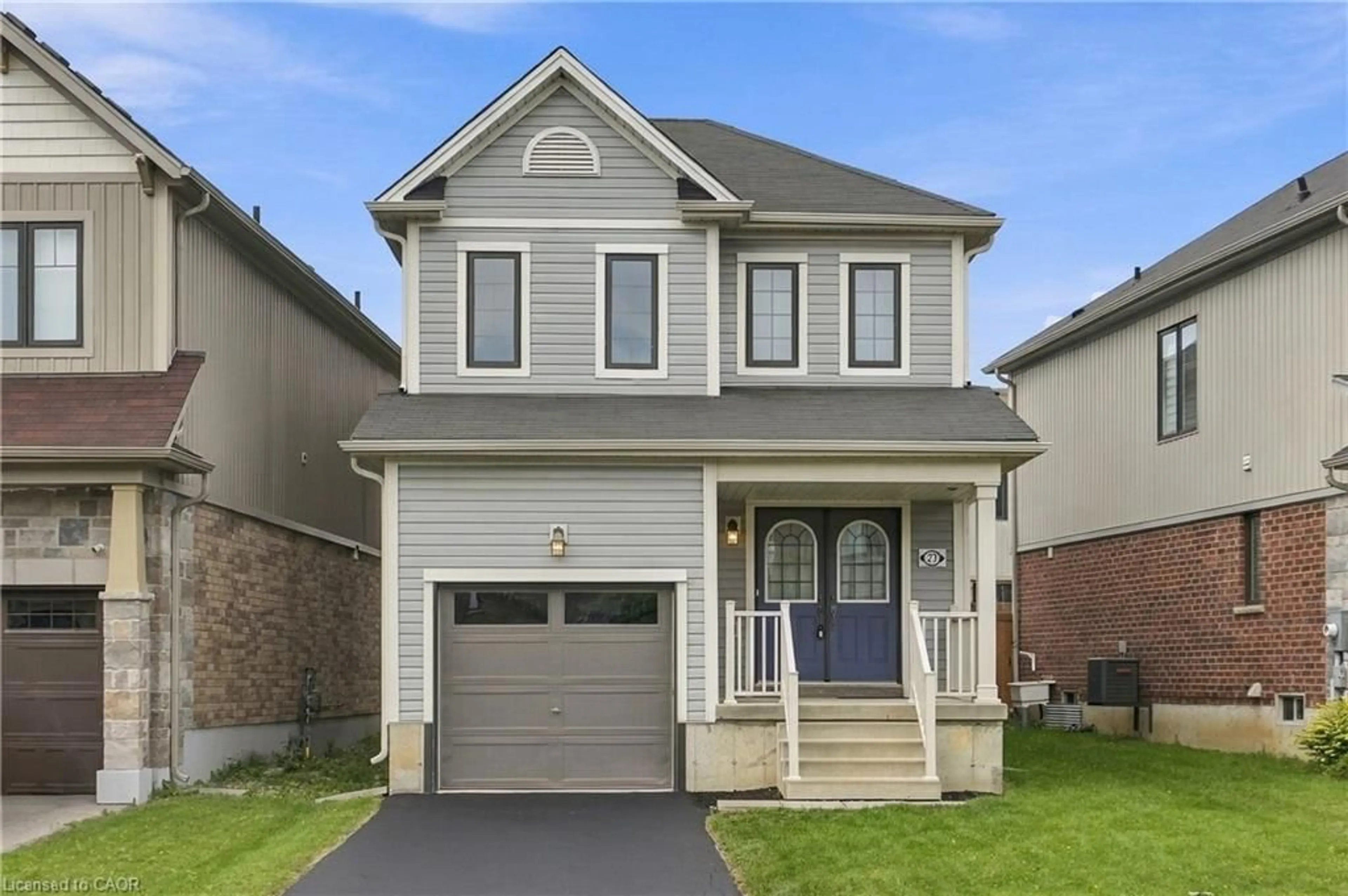 Home with vinyl exterior material, street for 23 Patterson Dr, Caledonia Ontario N3W 0B8