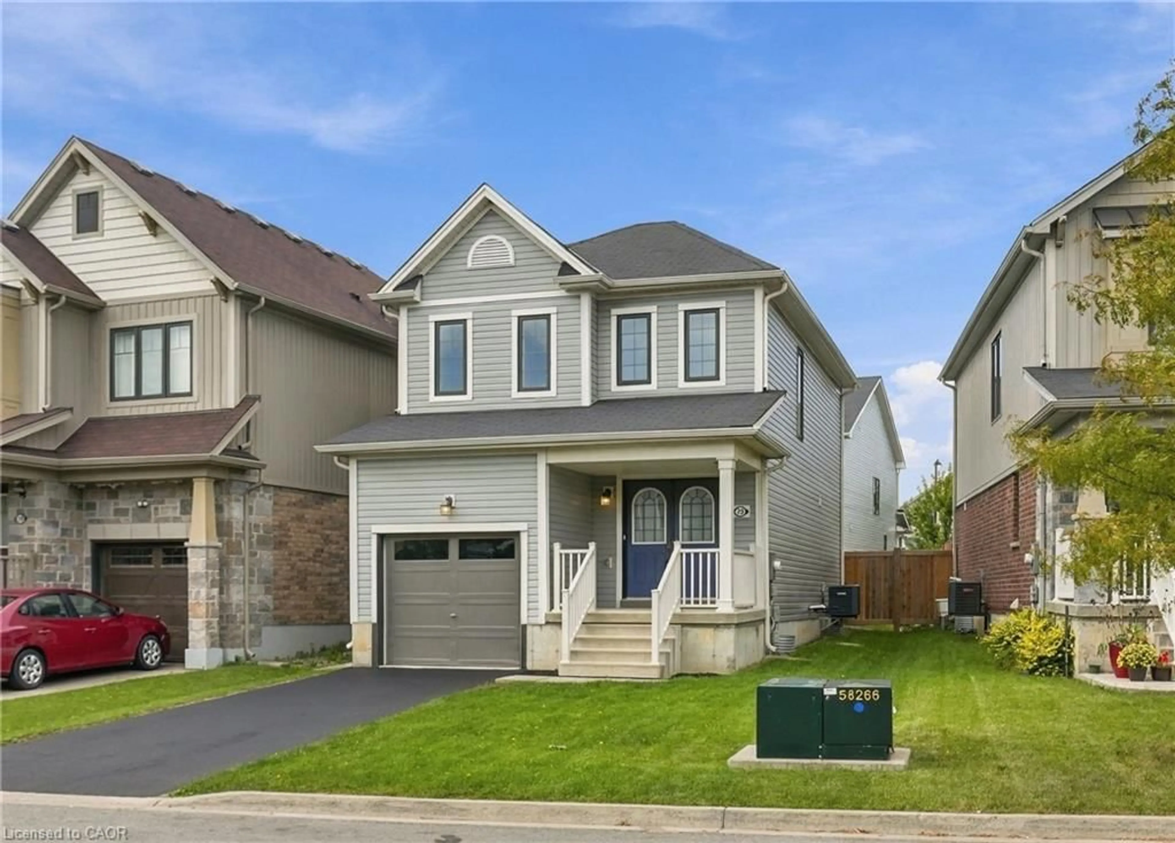 Home with vinyl exterior material, street for 23 Patterson Dr, Caledonia Ontario N3W 0B8