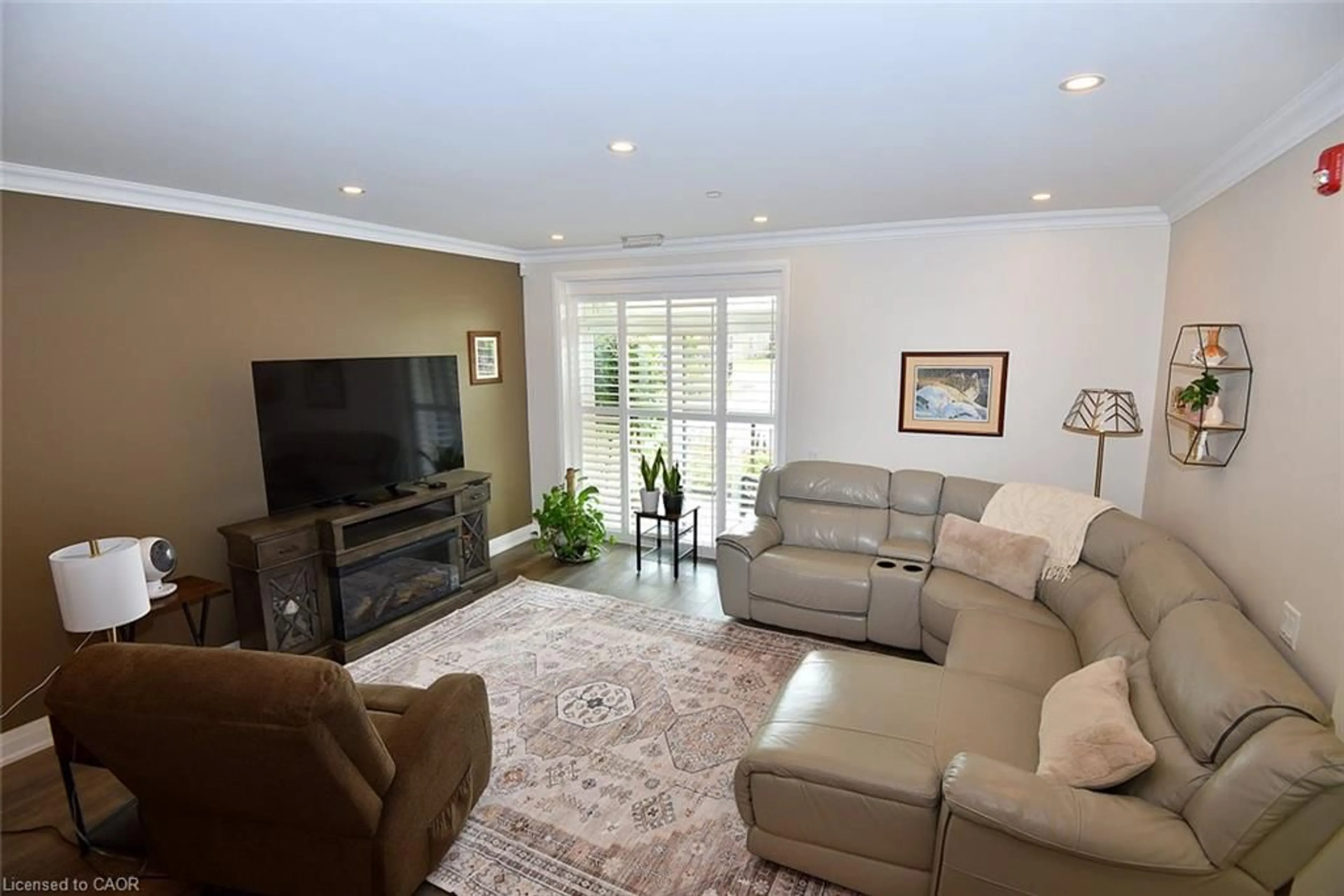 Living room with furniture, unknown for 830 Megson Terr #114, Milton Ontario L9T 9M7