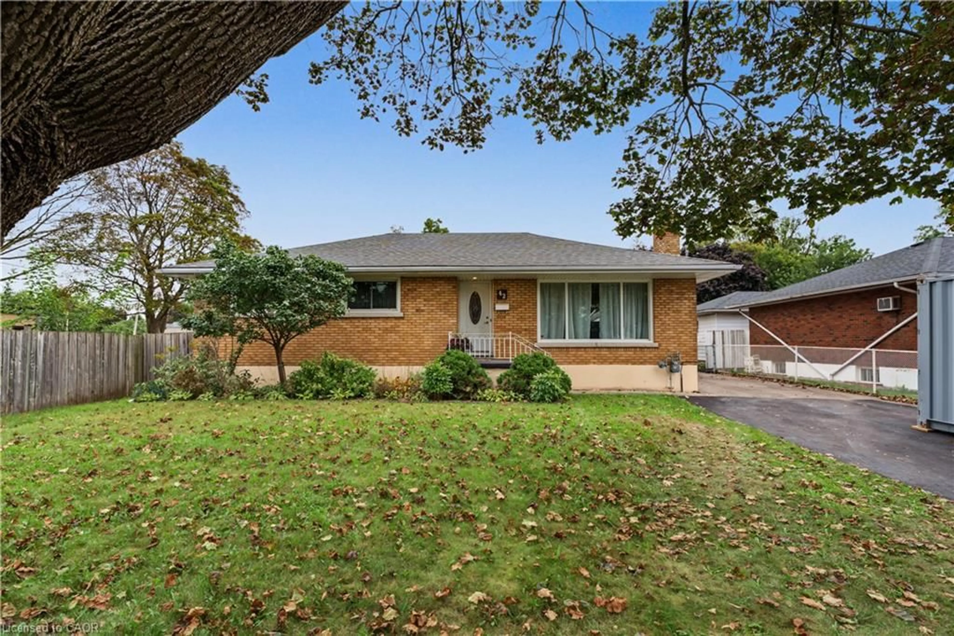 Home with brick exterior material, street for 42 Woodman Dr, Brantford Ontario N3S 4K1