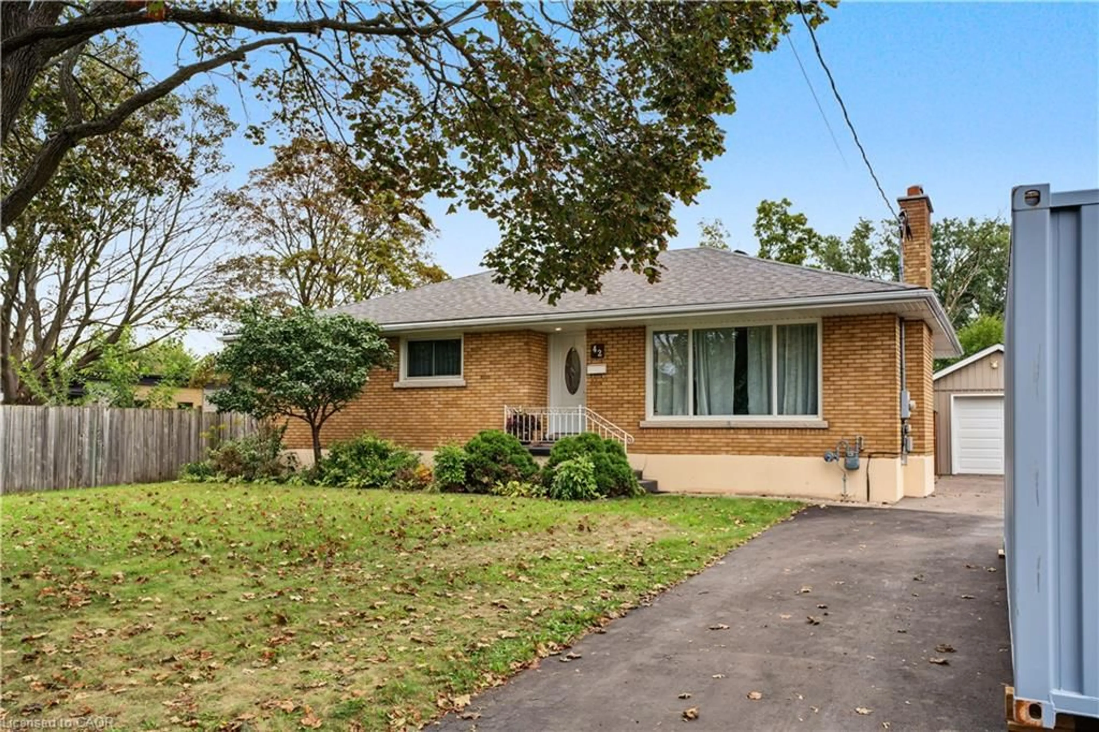 Home with brick exterior material, street for 42 Woodman Dr, Brantford Ontario N3S 4K1