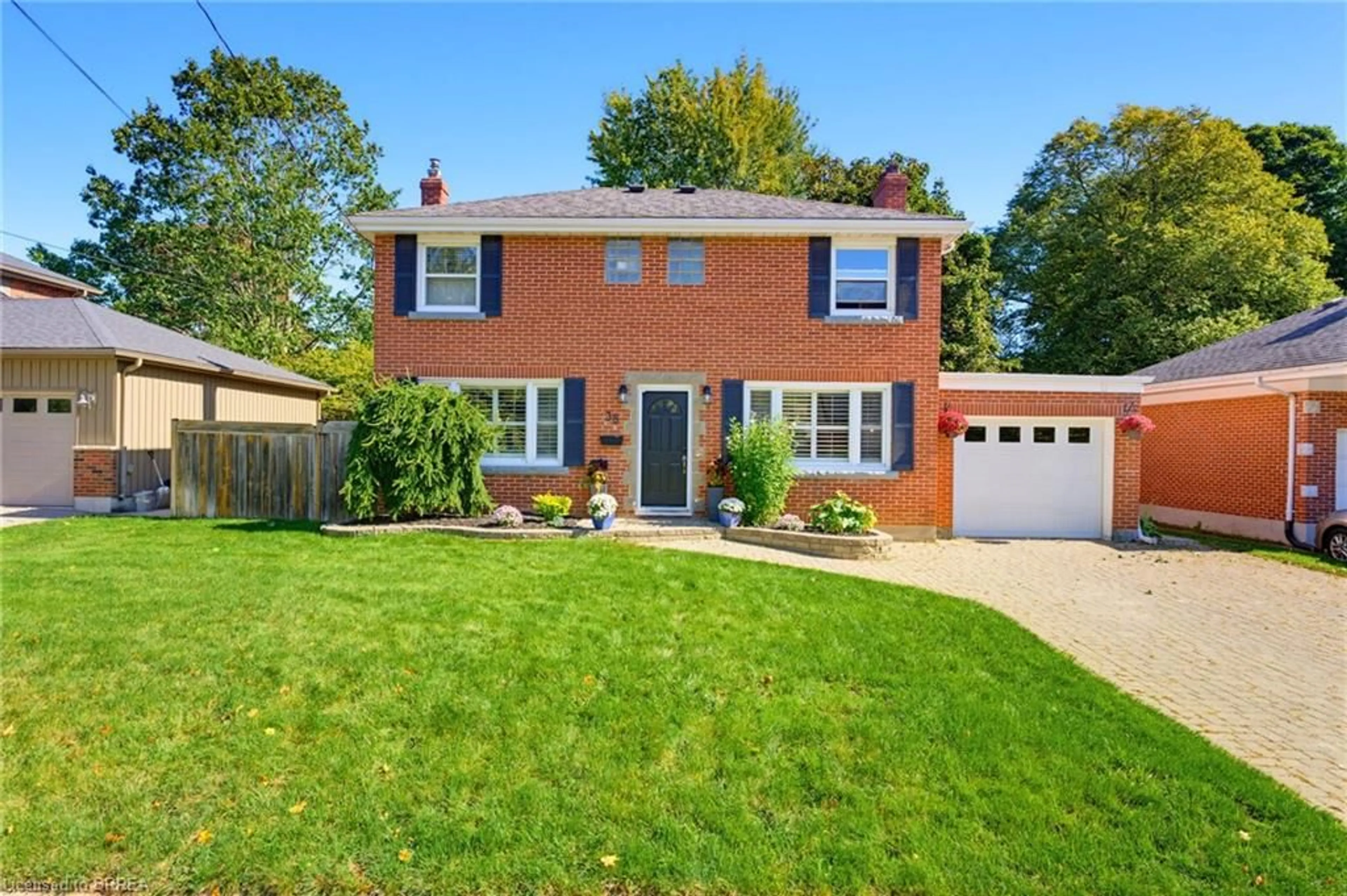 Home with brick exterior material, street for 38 Admiral Rd, Brantford Ontario N3R 1L6