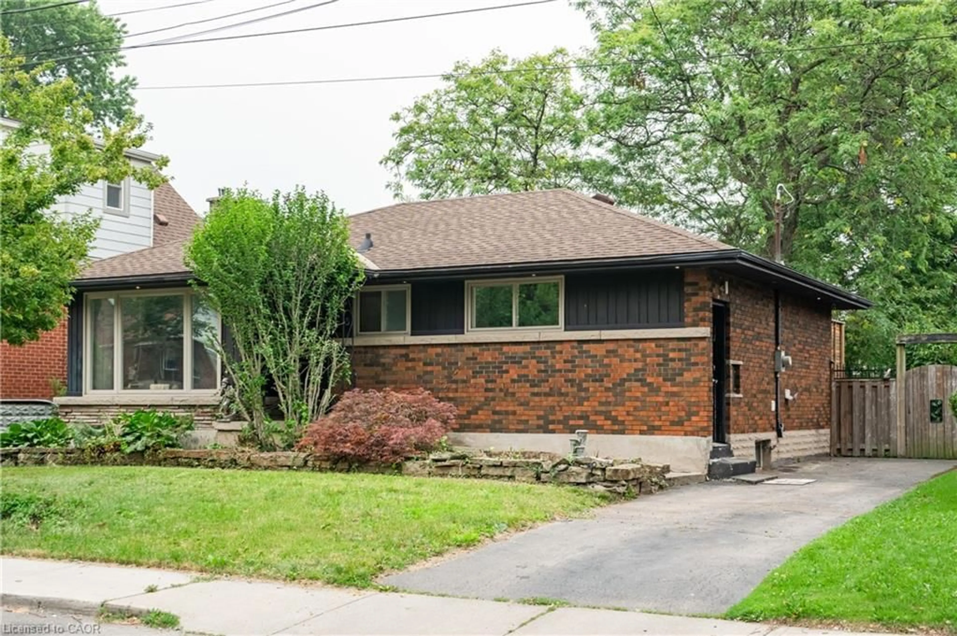 Home with brick exterior material, street for 83 East 15th St, Hamilton Ontario L9A 4E8