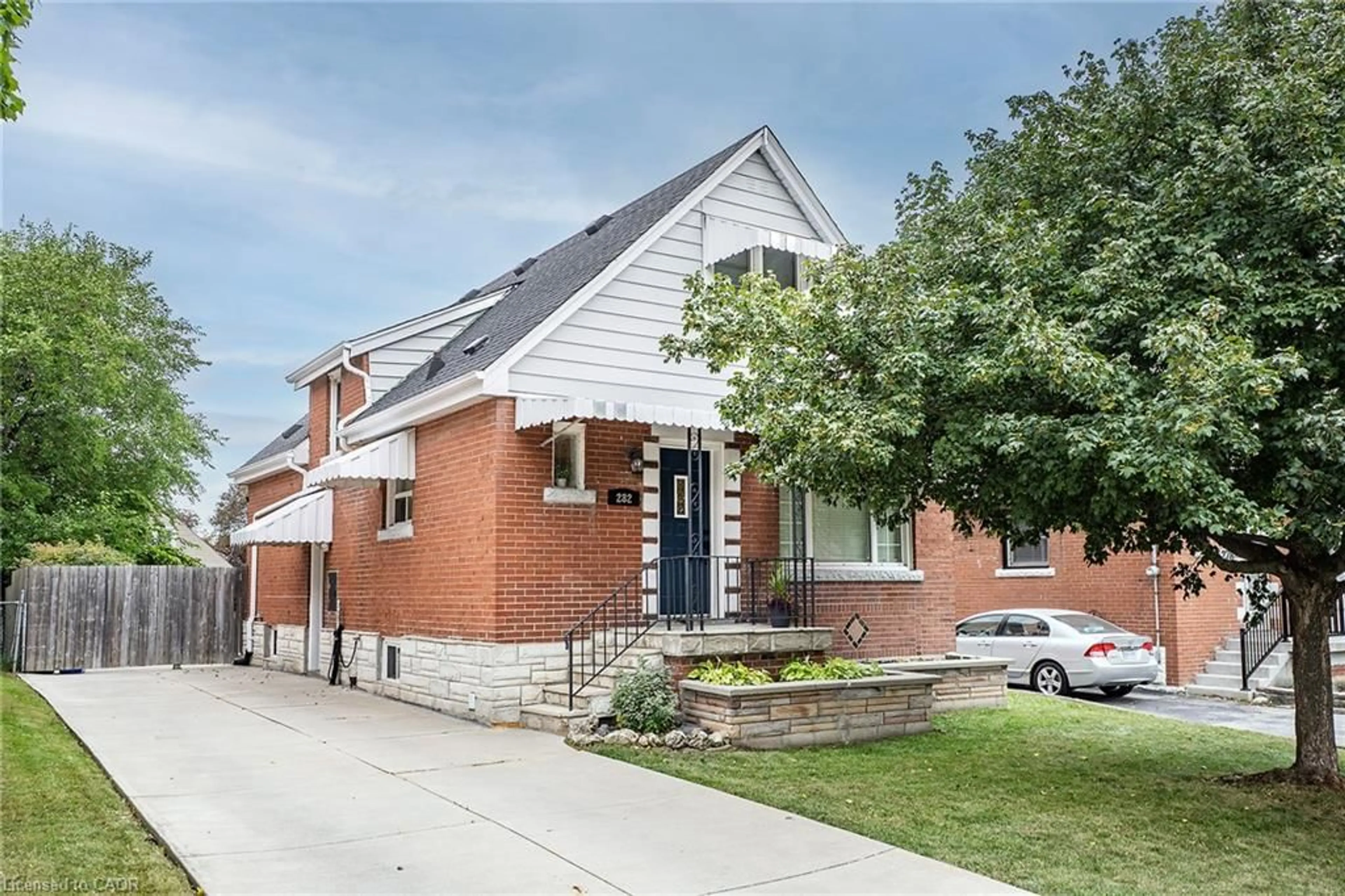 Home with brick exterior material, street for 282 East 13th St, Hamilton Ontario L9A 3Z9