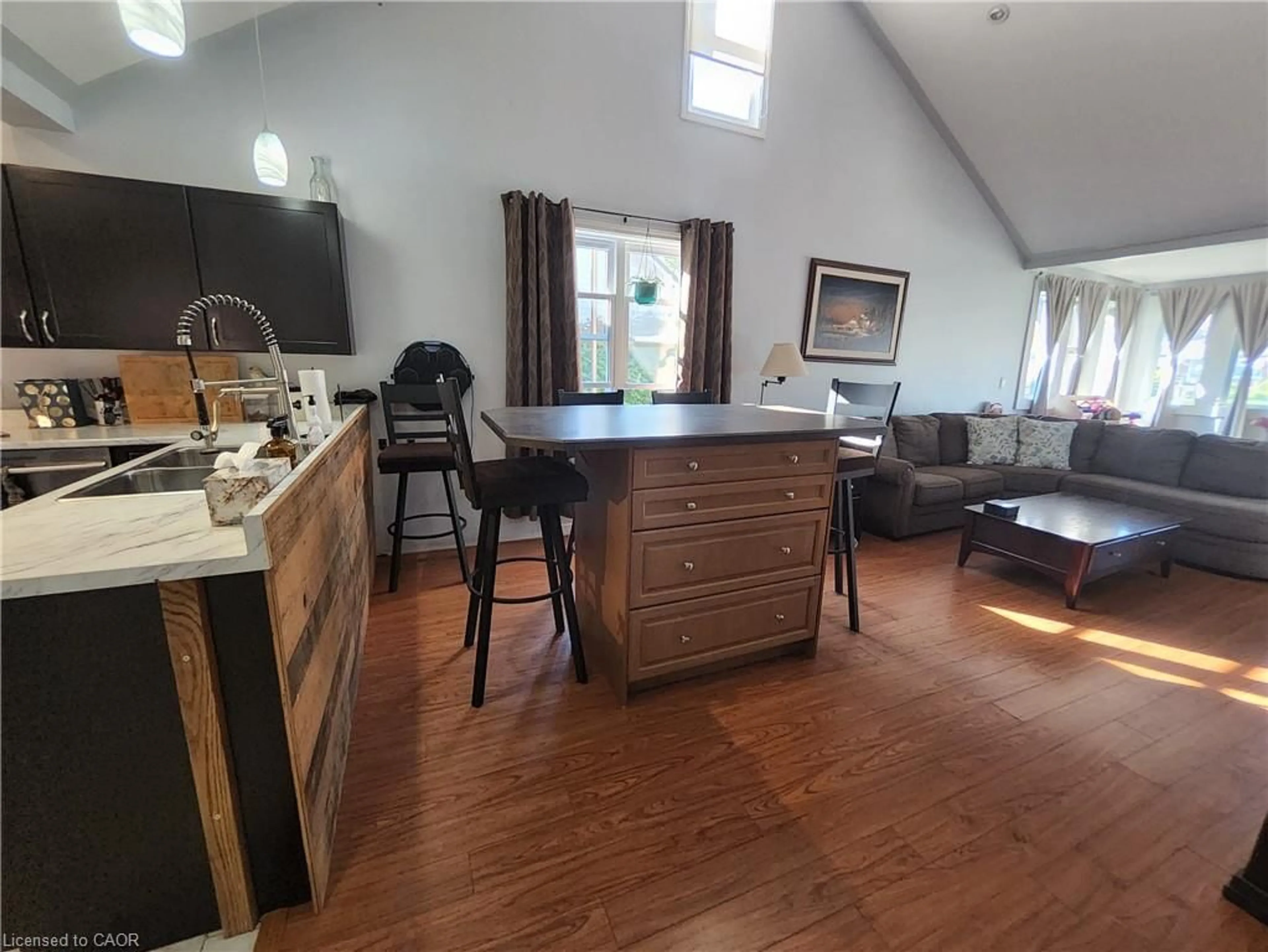 Open concept kitchen, wood/laminate floor for 196 North Main St, Simcoe Ontario N3Y 2M3