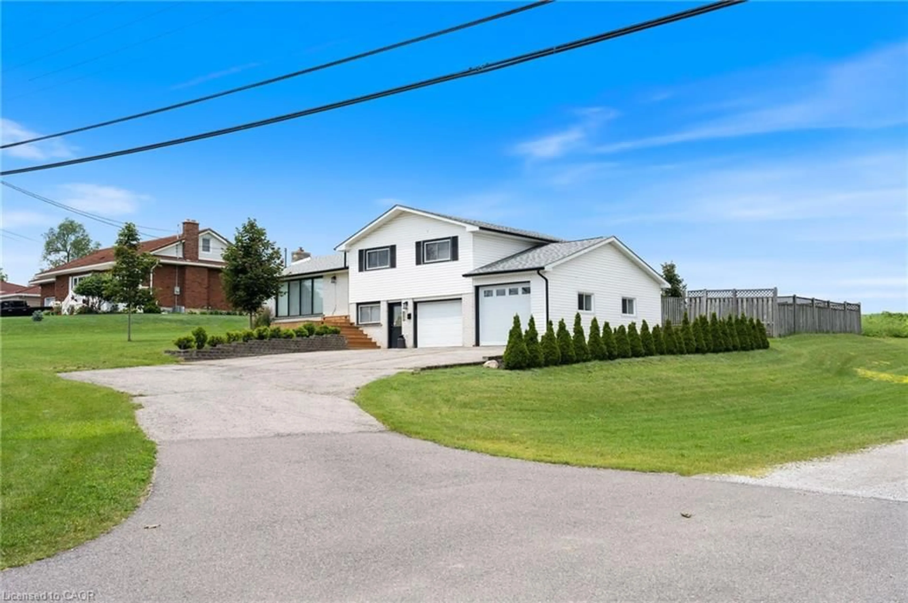 A pic from outside/outdoor area/front of a property/back of a property/a pic from drone, street for 351 Talbot Rd, Delhi Ontario N4B 2A1