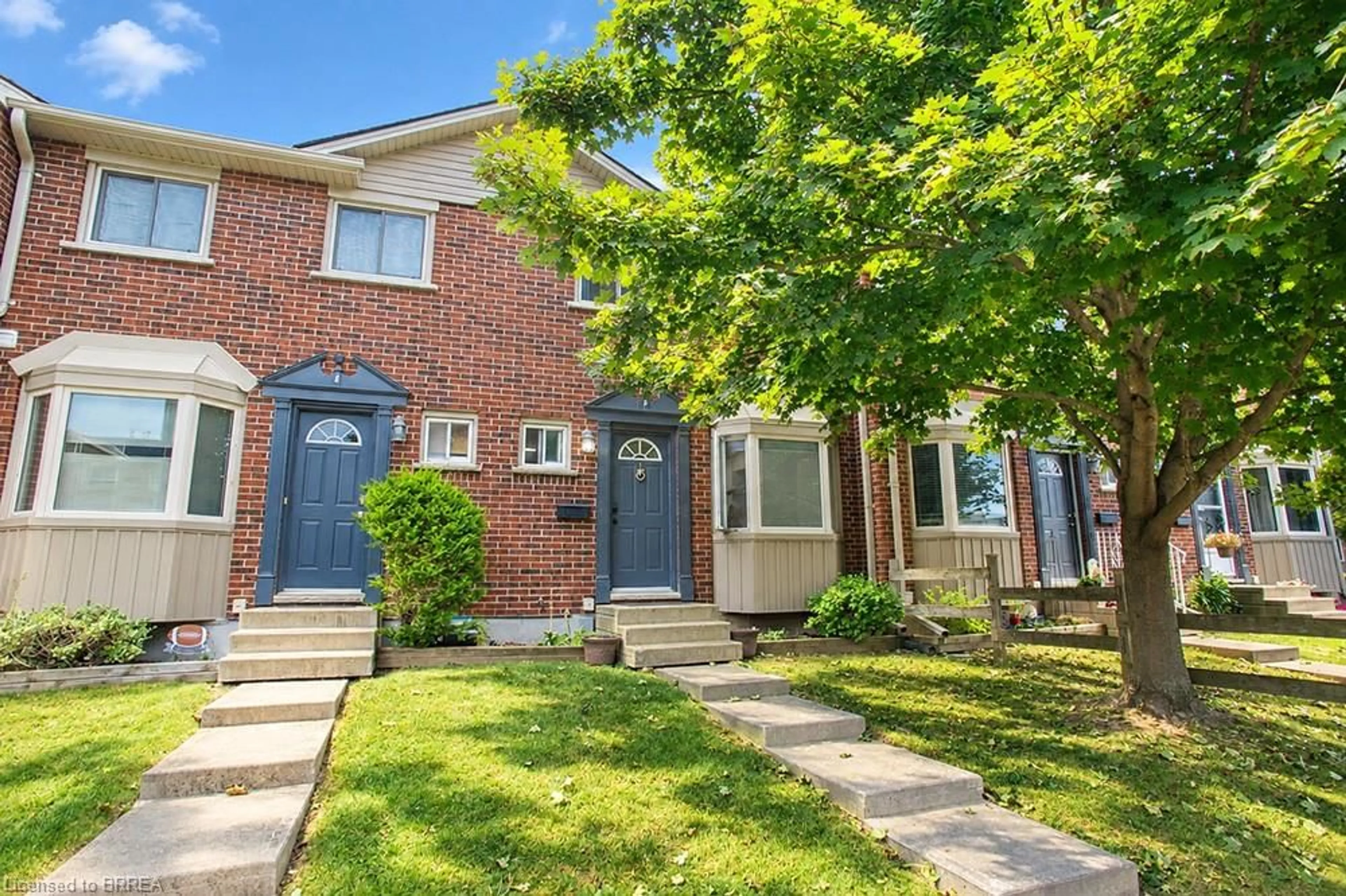 Home with brick exterior material, street for 151 Brantwood Park Rd #F, Brantford Ontario N3P 1X9