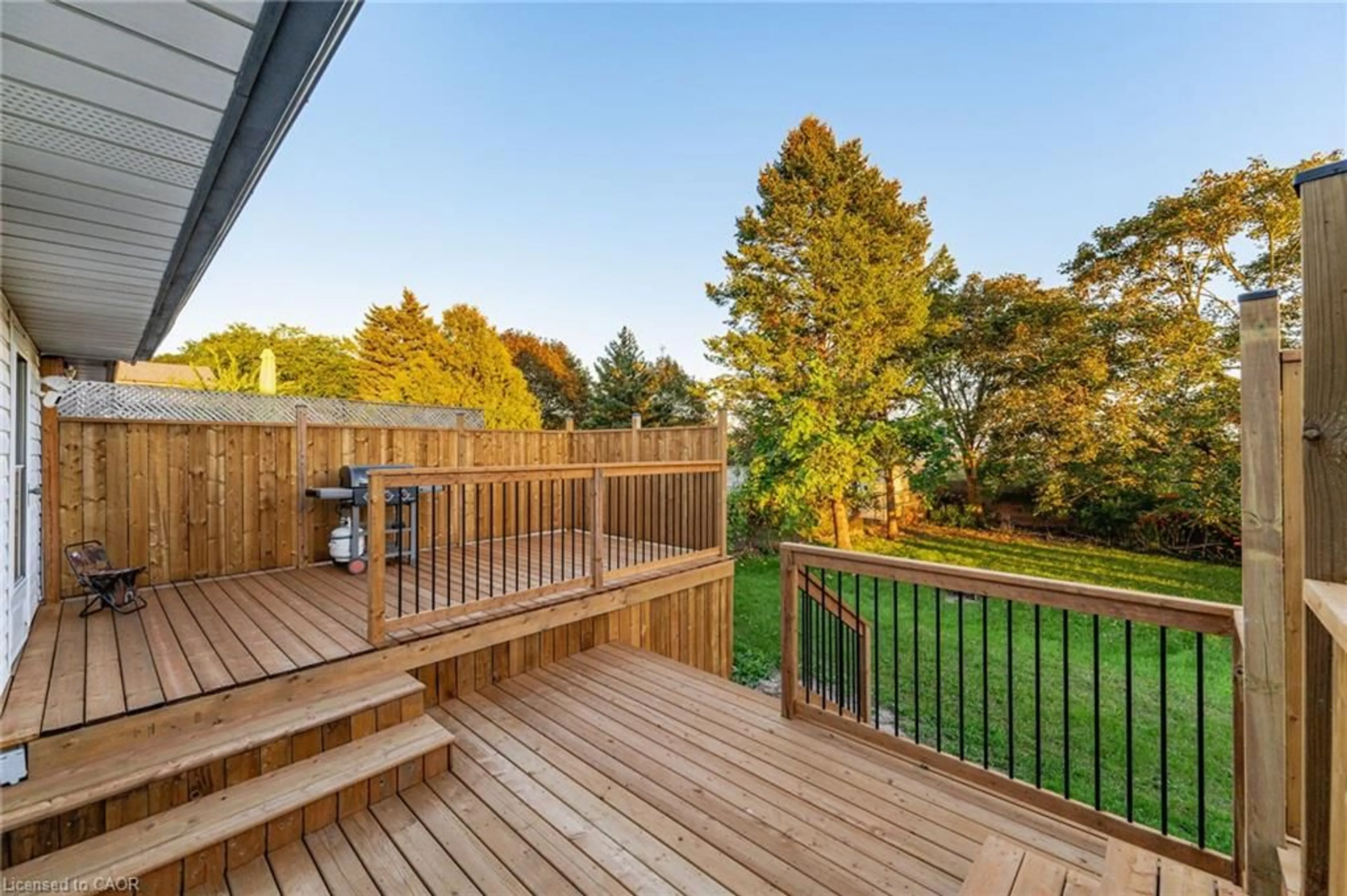 Patio, forest/trees view for 121 Southwood Dr, Kitchener Ontario N2E 2J1