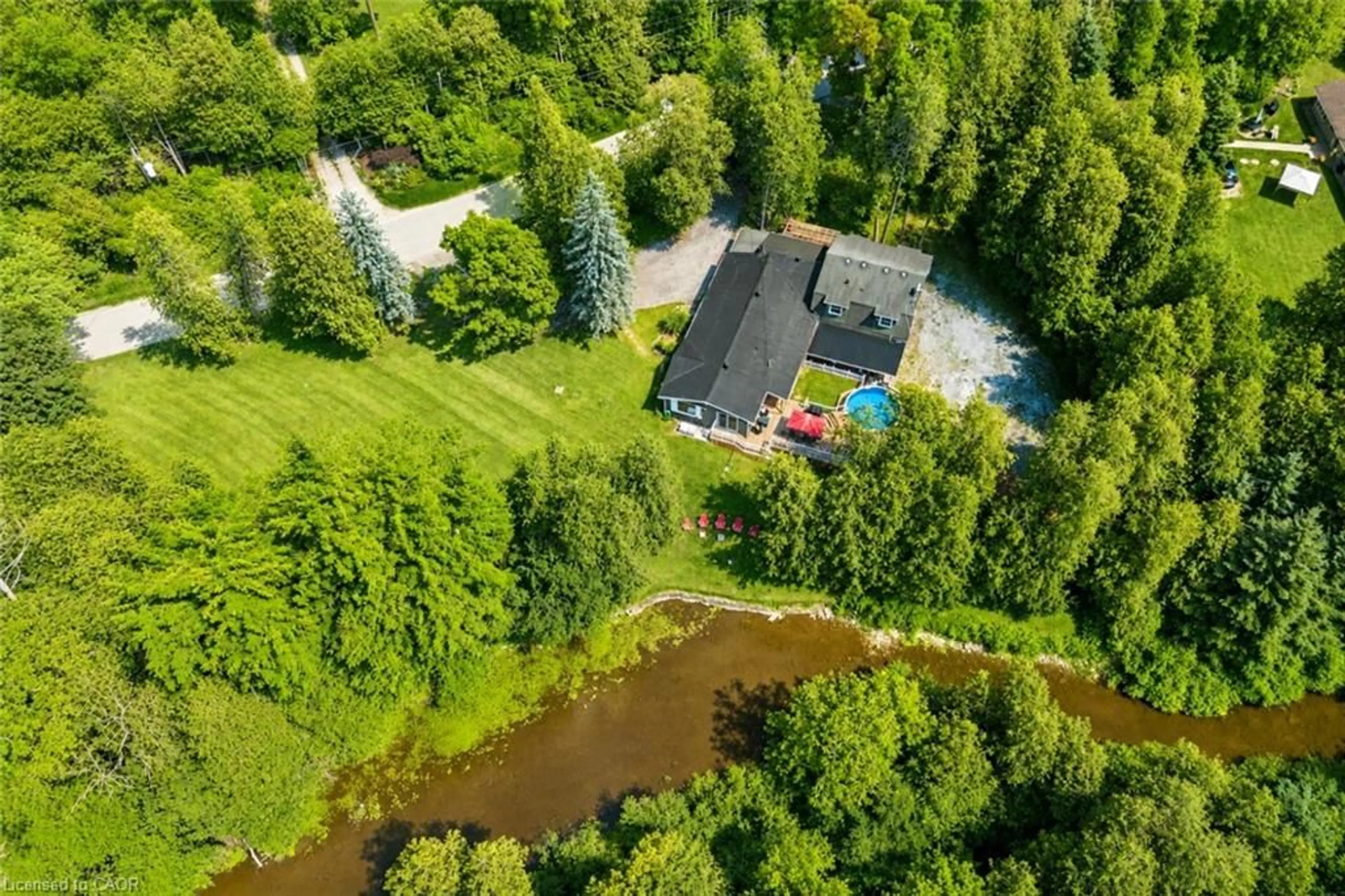 A pic from outside/outdoor area/front of a property/back of a property/a pic from drone, water/lake/river/ocean view for 14 Ash St, Eden Mills Ontario N0B 2K0