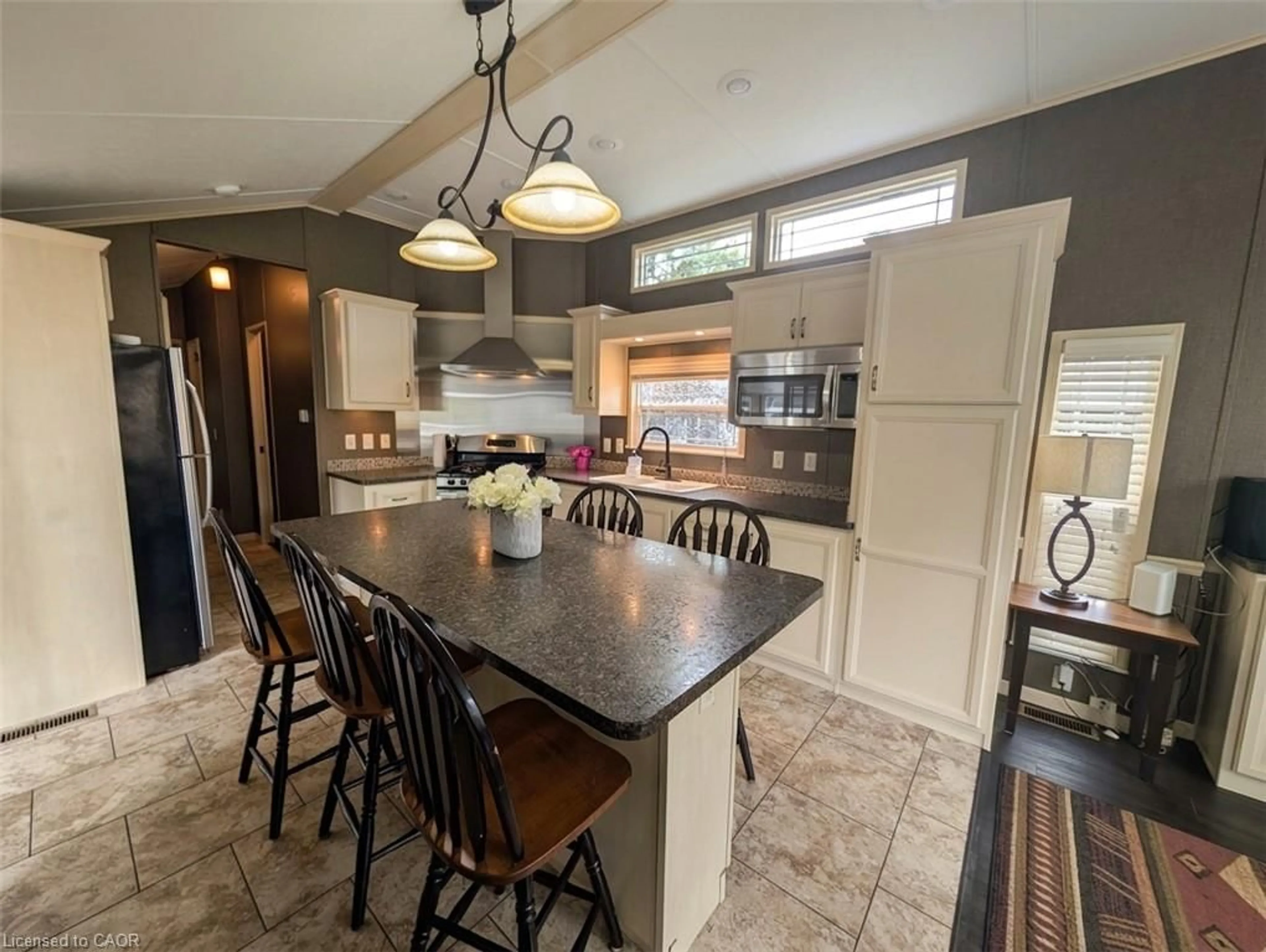 Open concept kitchen, ceramic/tile floor for 34 Temagami Trail, Wasaga Beach Ontario L9Z 1X7