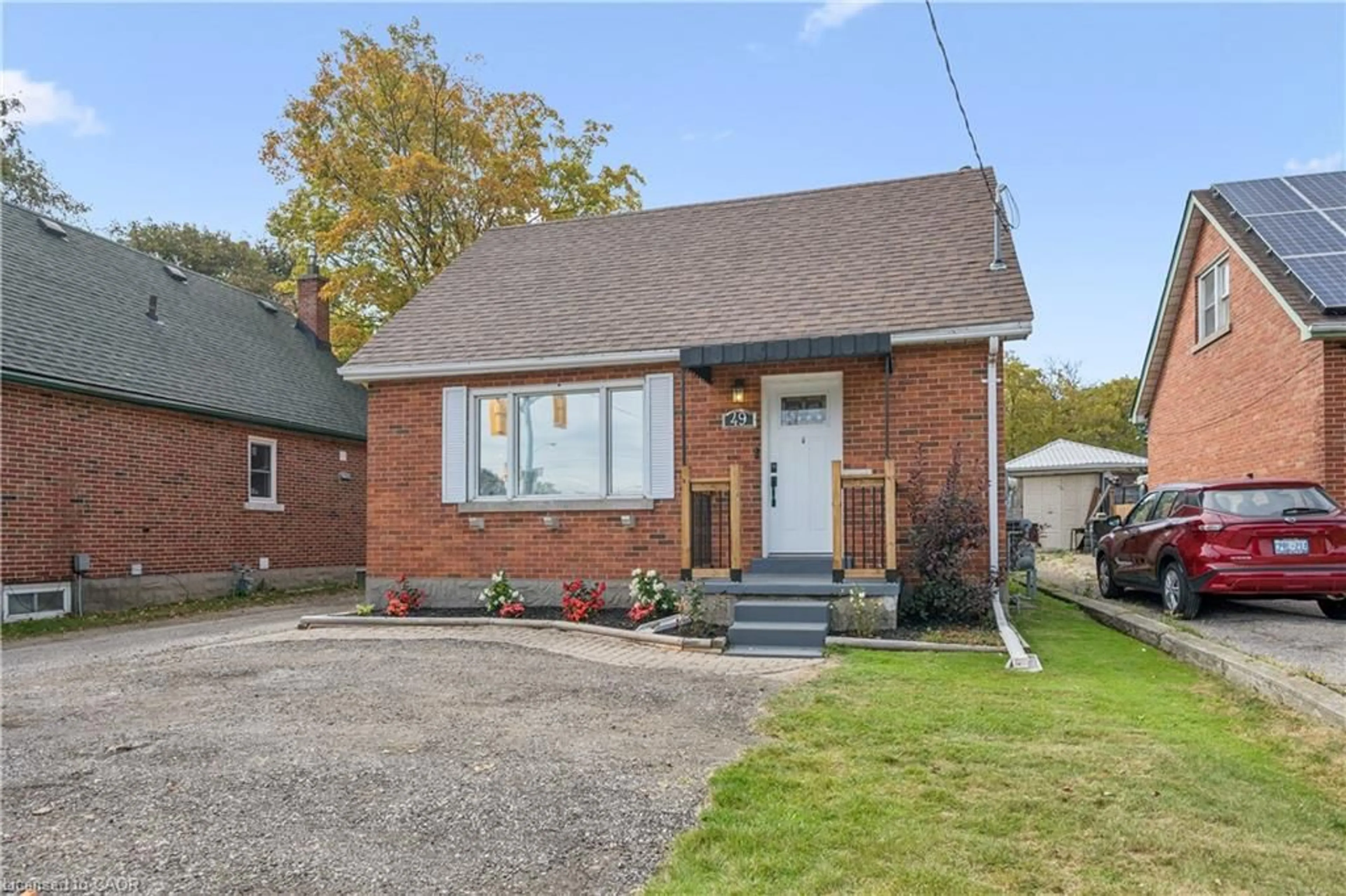 Home with brick exterior material, street for 49 Edna St, Kitchener Ontario N2H 2E2