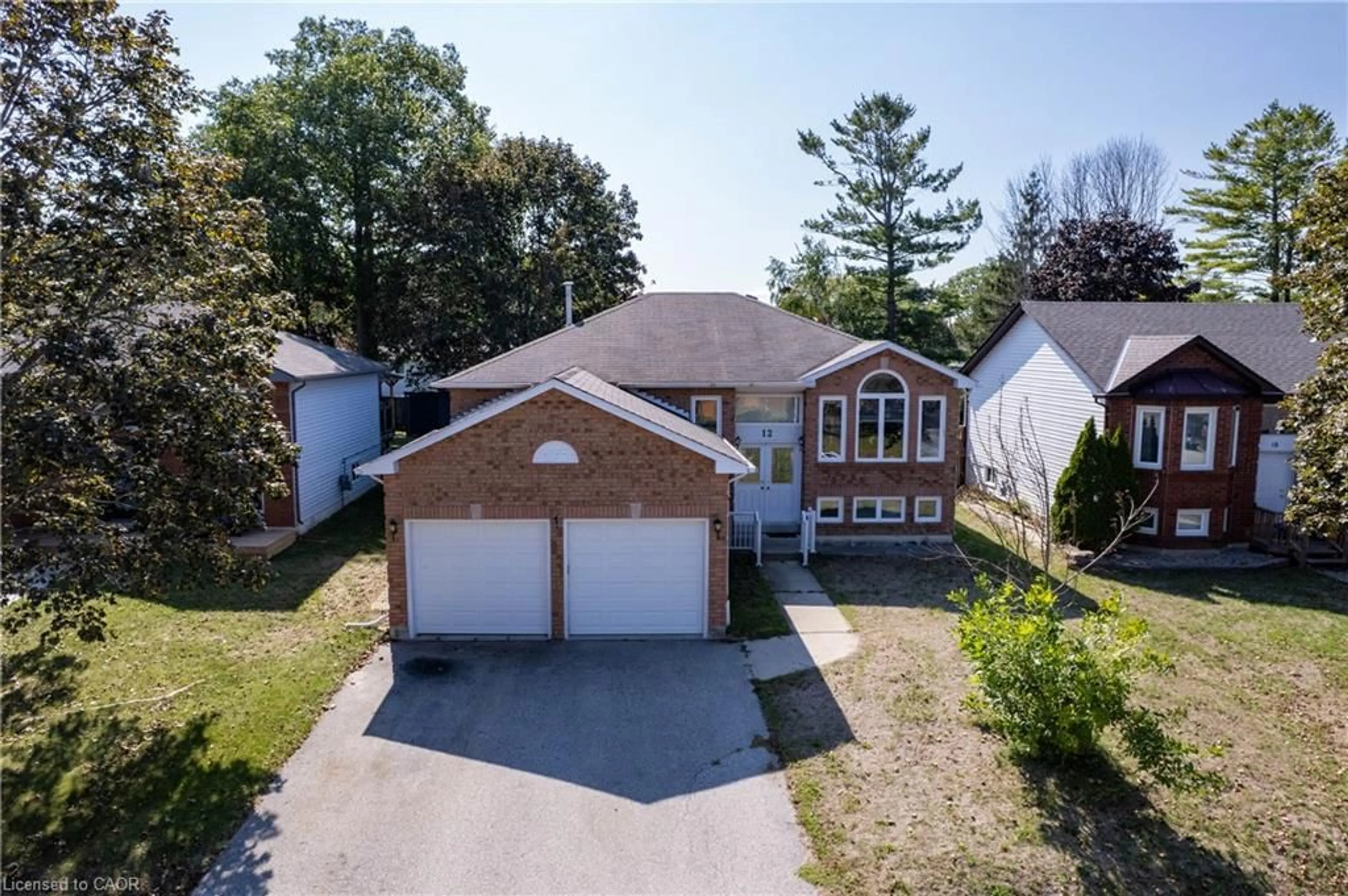 A pic from outside/outdoor area/front of a property/back of a property/a pic from drone, street for 12 Langevin Dr, Wasaga Beach Ontario L9Z 1C6
