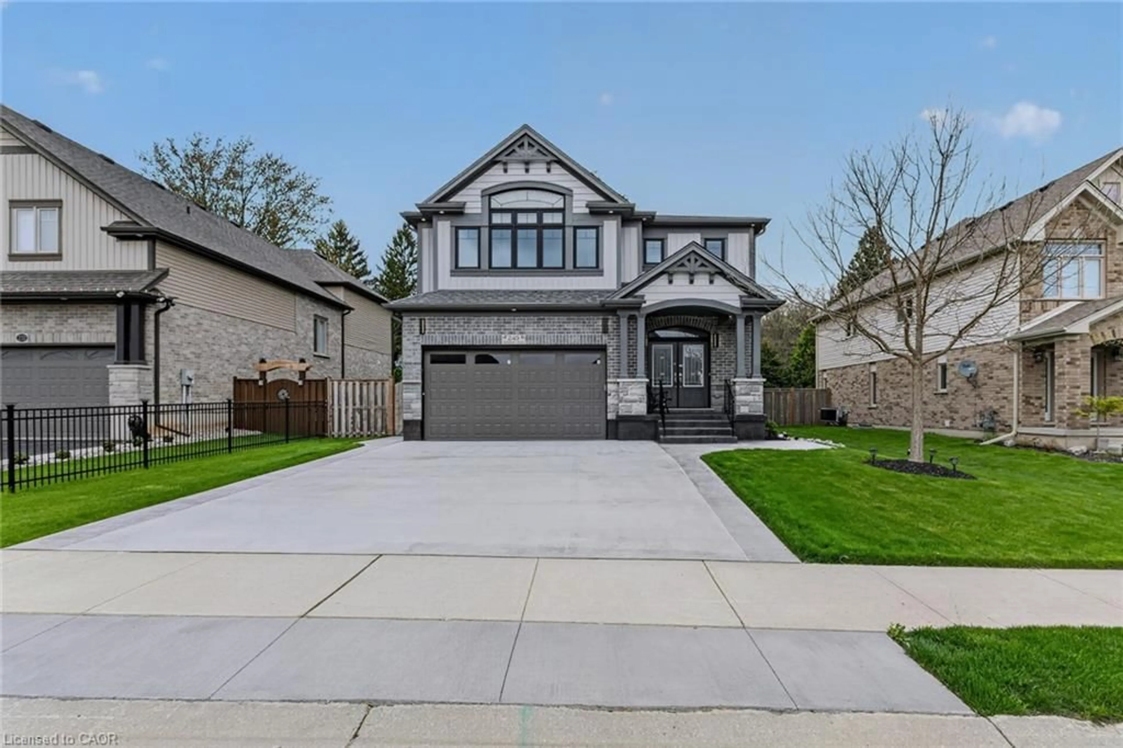Home with brick exterior material, street for 249 Woodway Trail, Simcoe Ontario N3Y 0C7