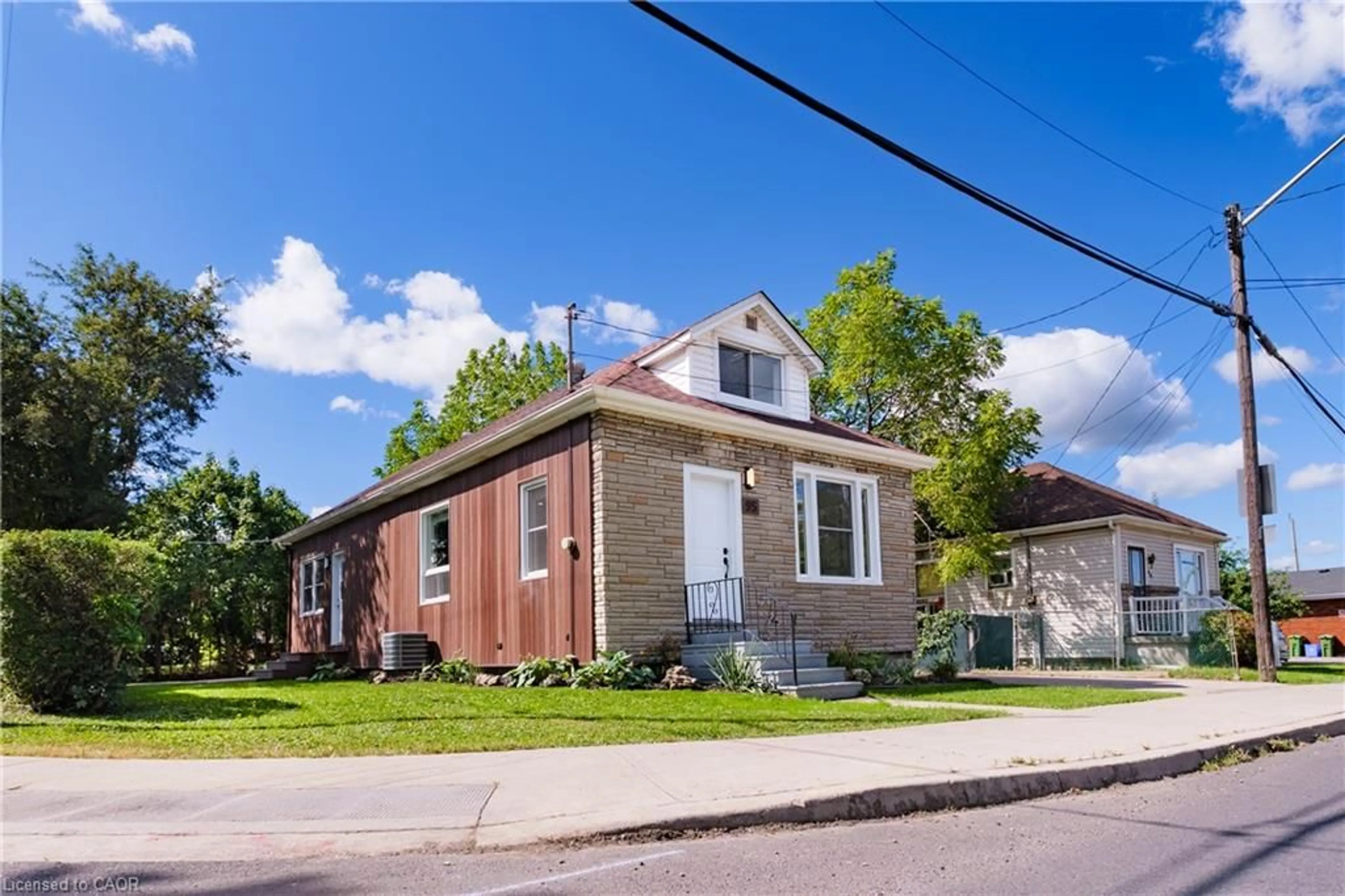 Home with brick exterior material, street for 95 Fennell Ave, Hamilton Ontario L9C 1E9