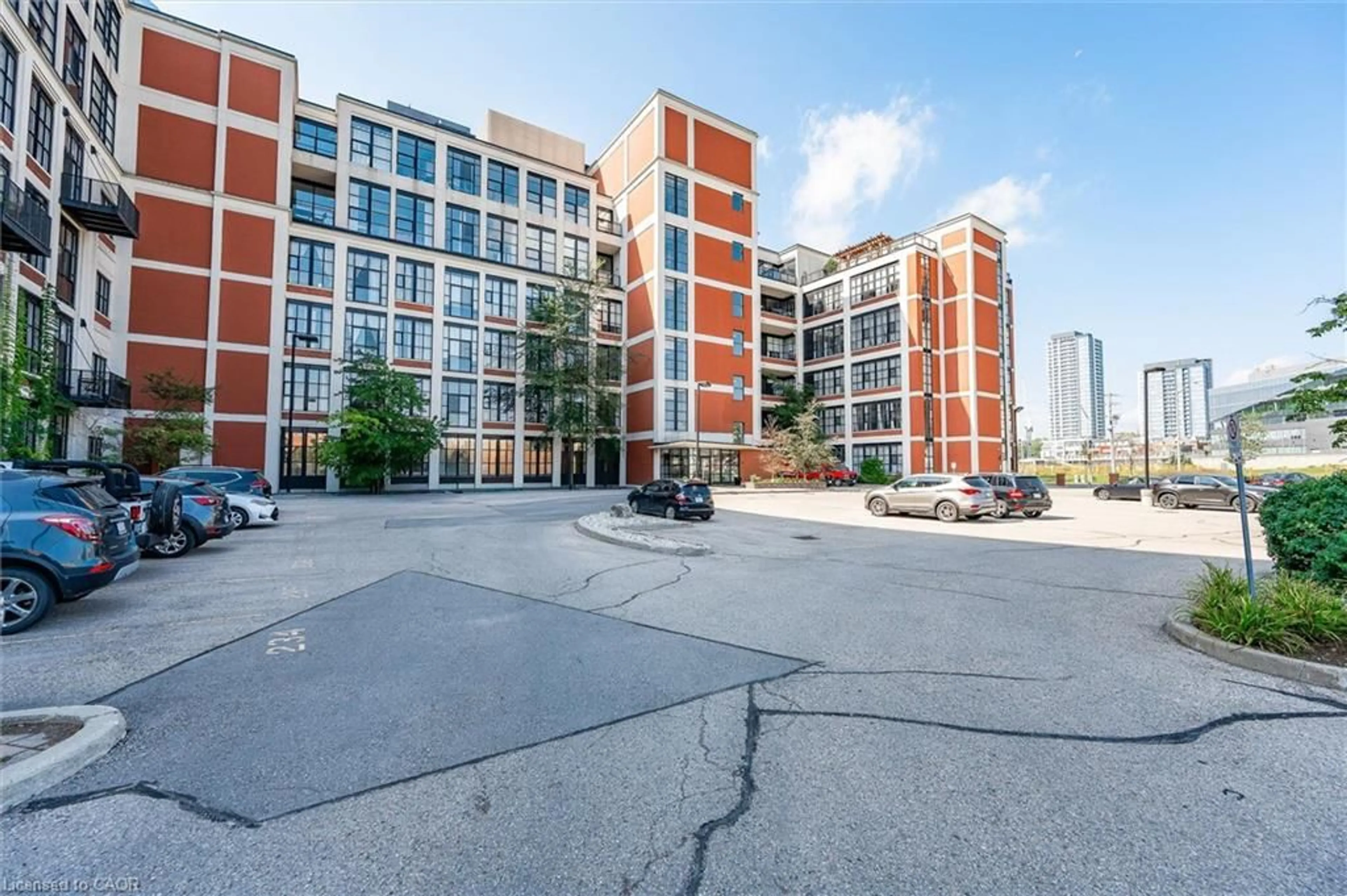 A pic from outside/outdoor area/front of a property/back of a property/a pic from drone, unknown for 410 King St #112, Kitchener Ontario N2G 1C3
