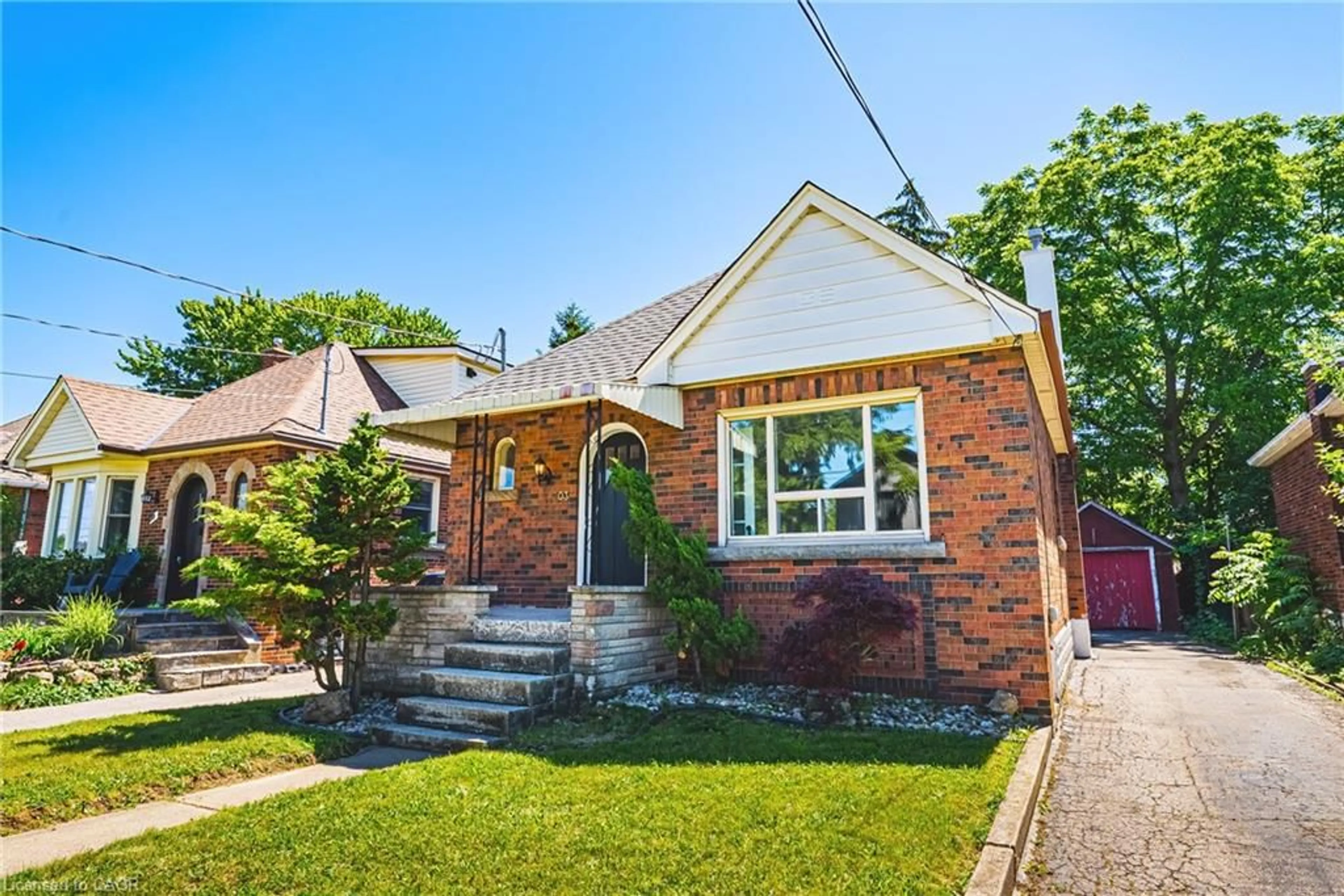 Home with brick exterior material, street for 203 West 2nd St, Hamilton Ontario L9C 3G2