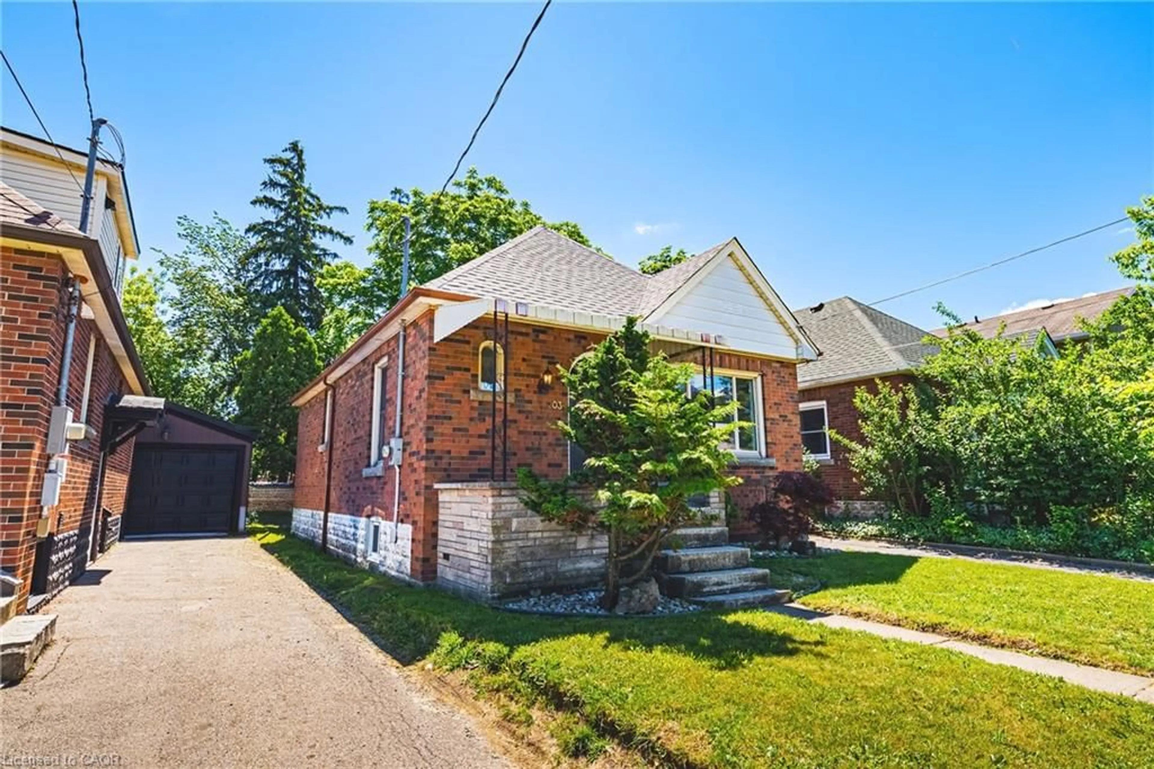 Home with brick exterior material, street for 203 West 2nd St, Hamilton Ontario L9C 3G2