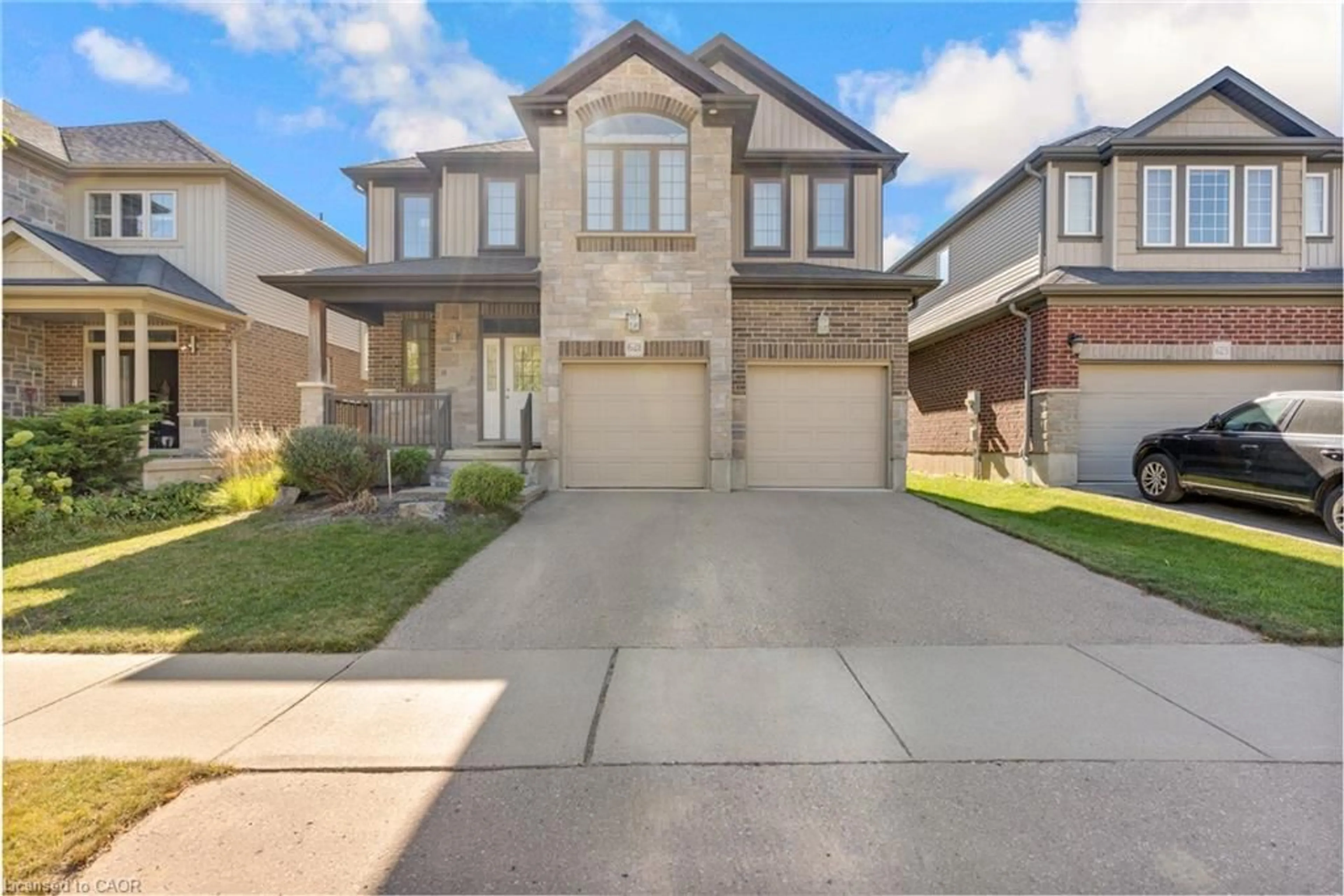 Home with brick exterior material, street for 621 Sundew Dr, Waterloo Ontario N2V 0C1
