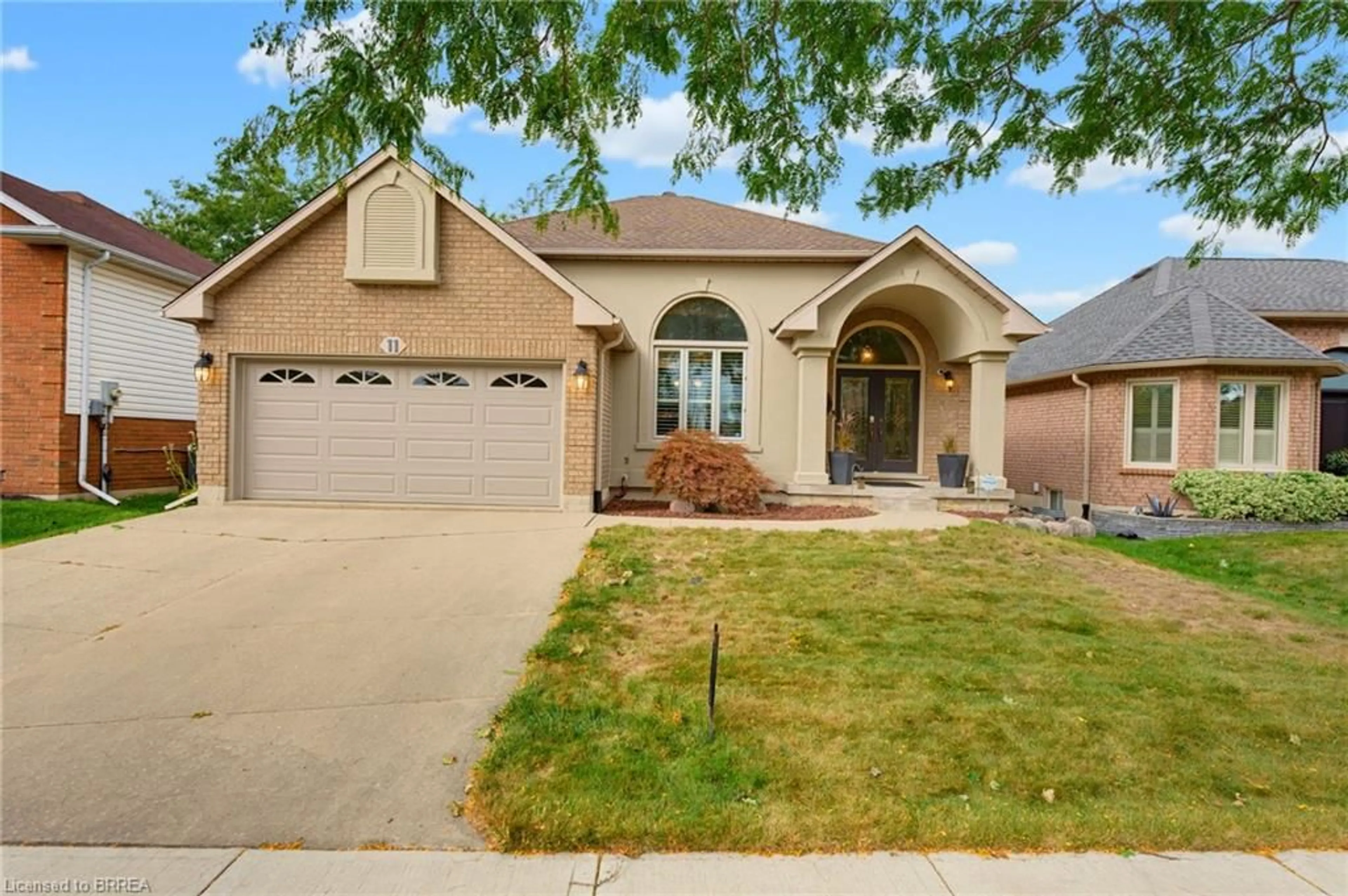 Home with brick exterior material, street for 11 Courtland Dr, Brantford Ontario N3R 7V8