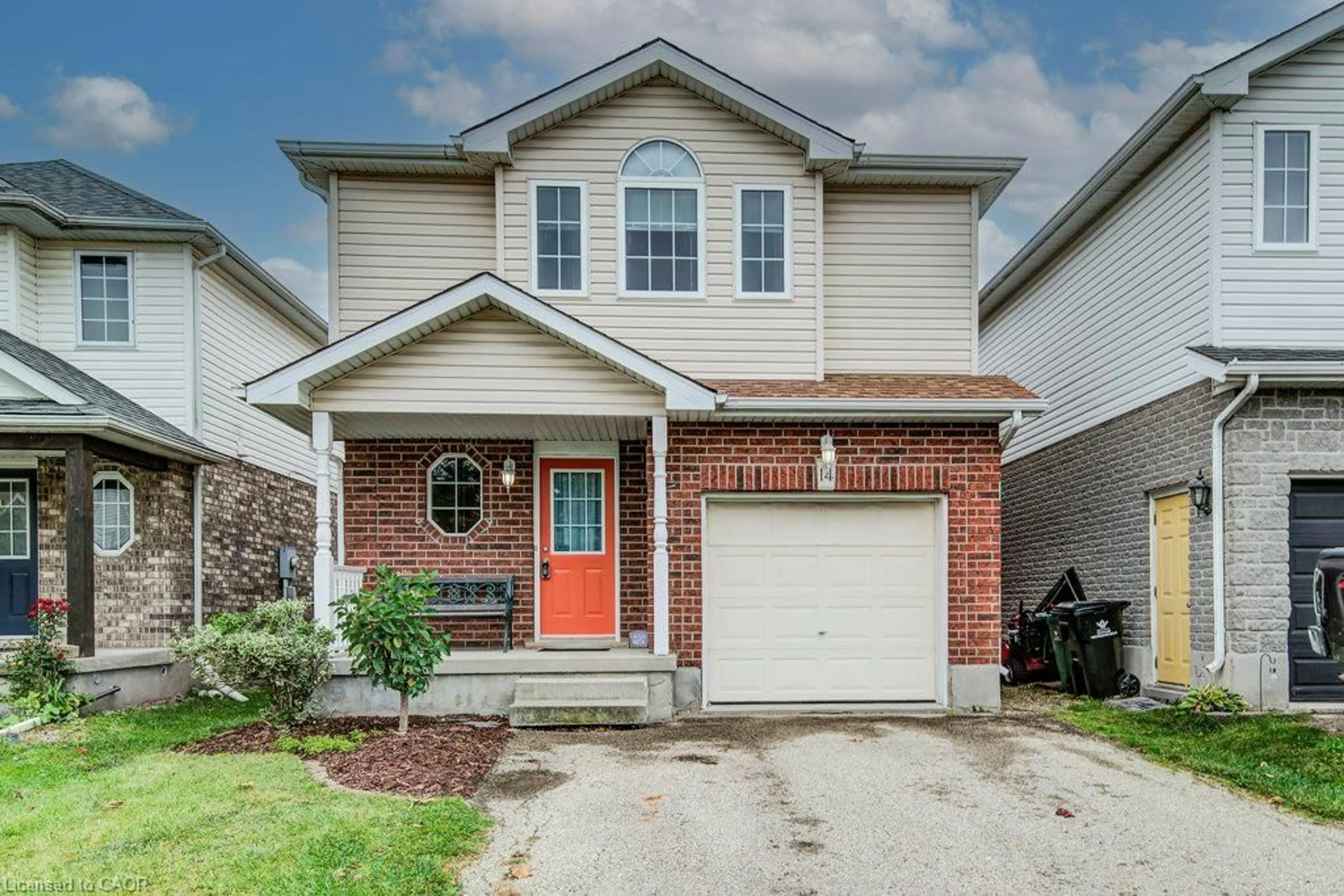 Home with brick exterior material, street for 14 Raising Mill Gate, Elmira Ontario N3B 3K8