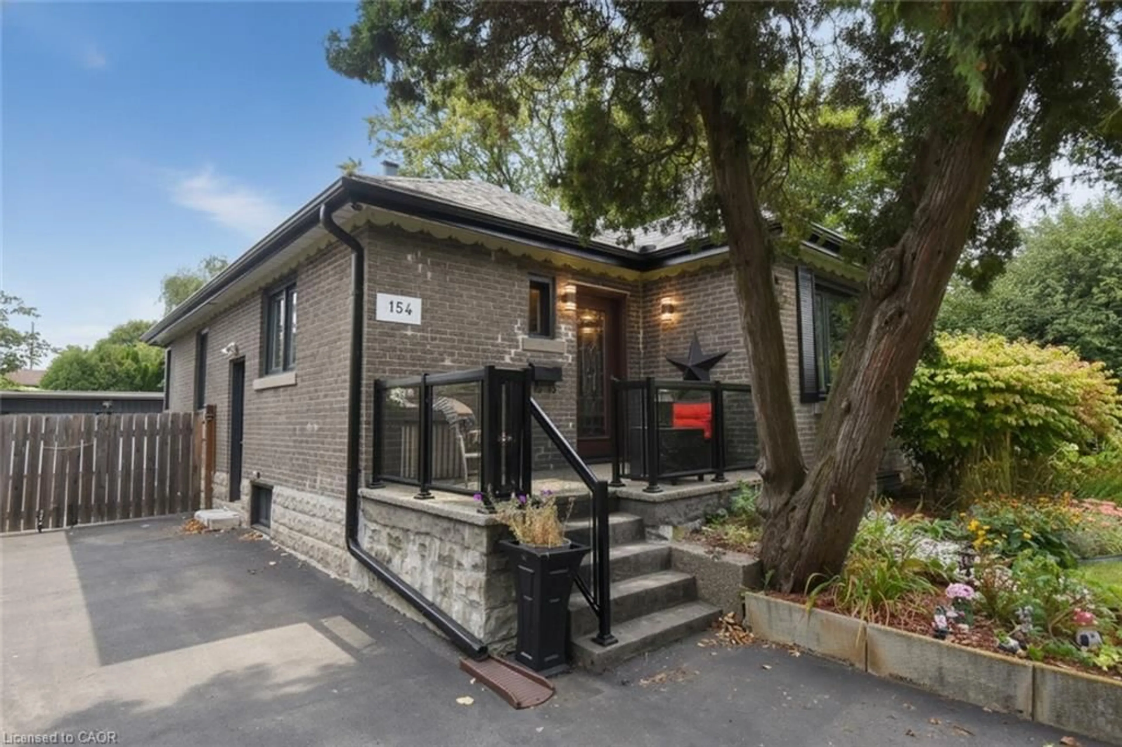 Home with brick exterior material, street for 154 Ewen Rd, Hamilton Ontario L8S 3C7