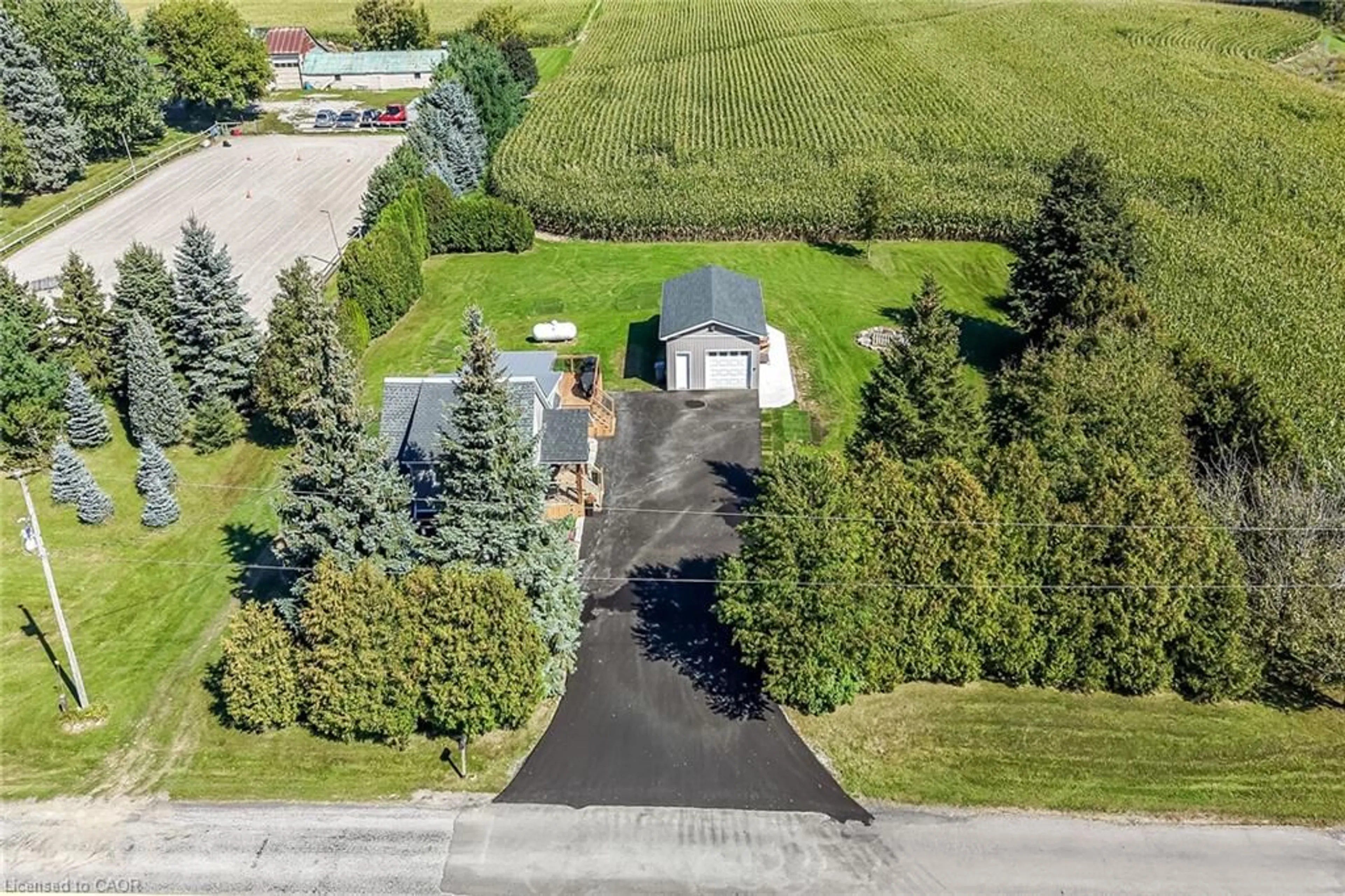 A pic from outside/outdoor area/front of a property/back of a property/a pic from drone, street for 359 First Line, Hagersville Ontario N0A 1H0