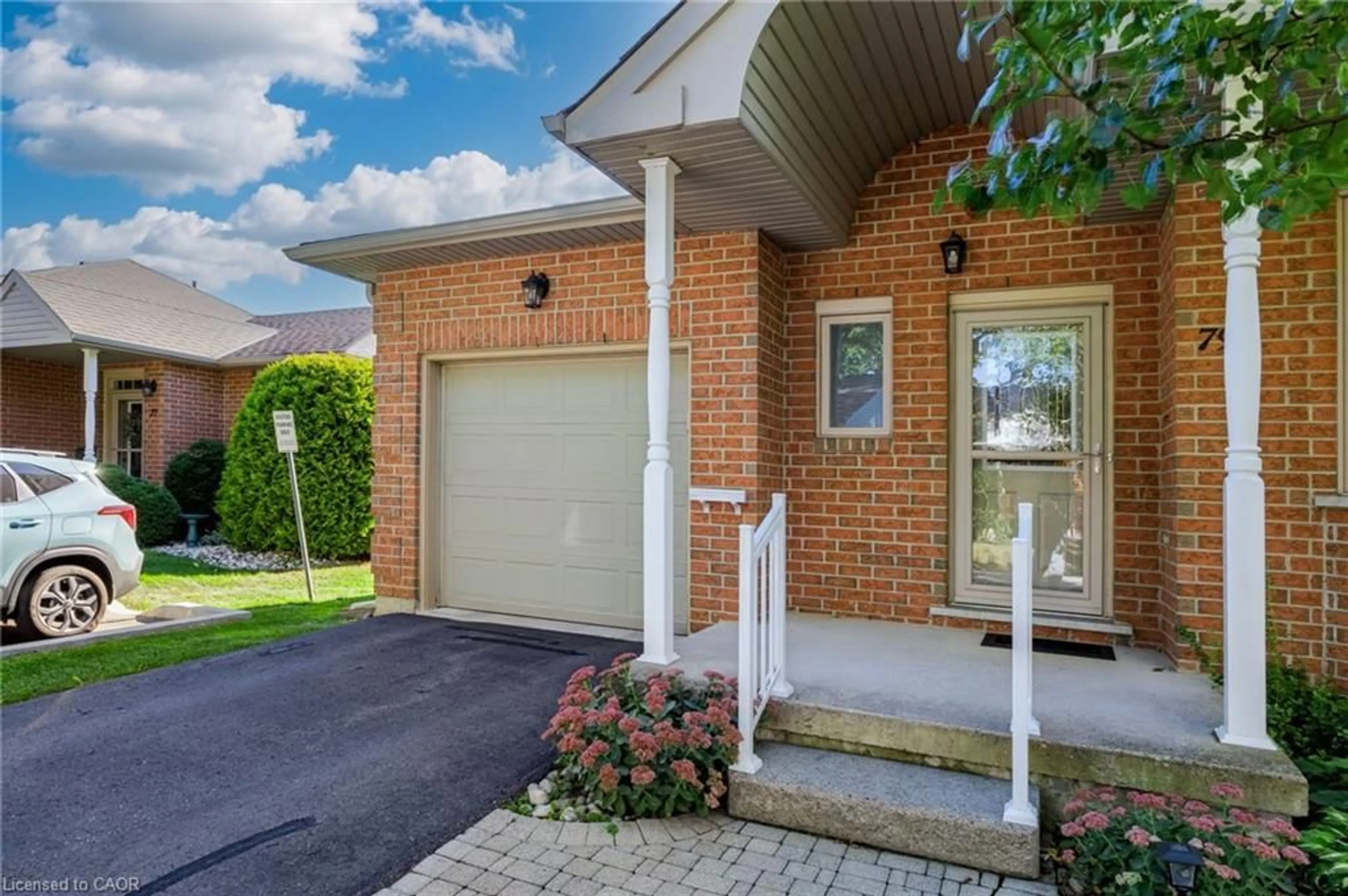 Home with brick exterior material, street for 79 Greentrail Dr, Mount Hope Ontario L0R 1W0