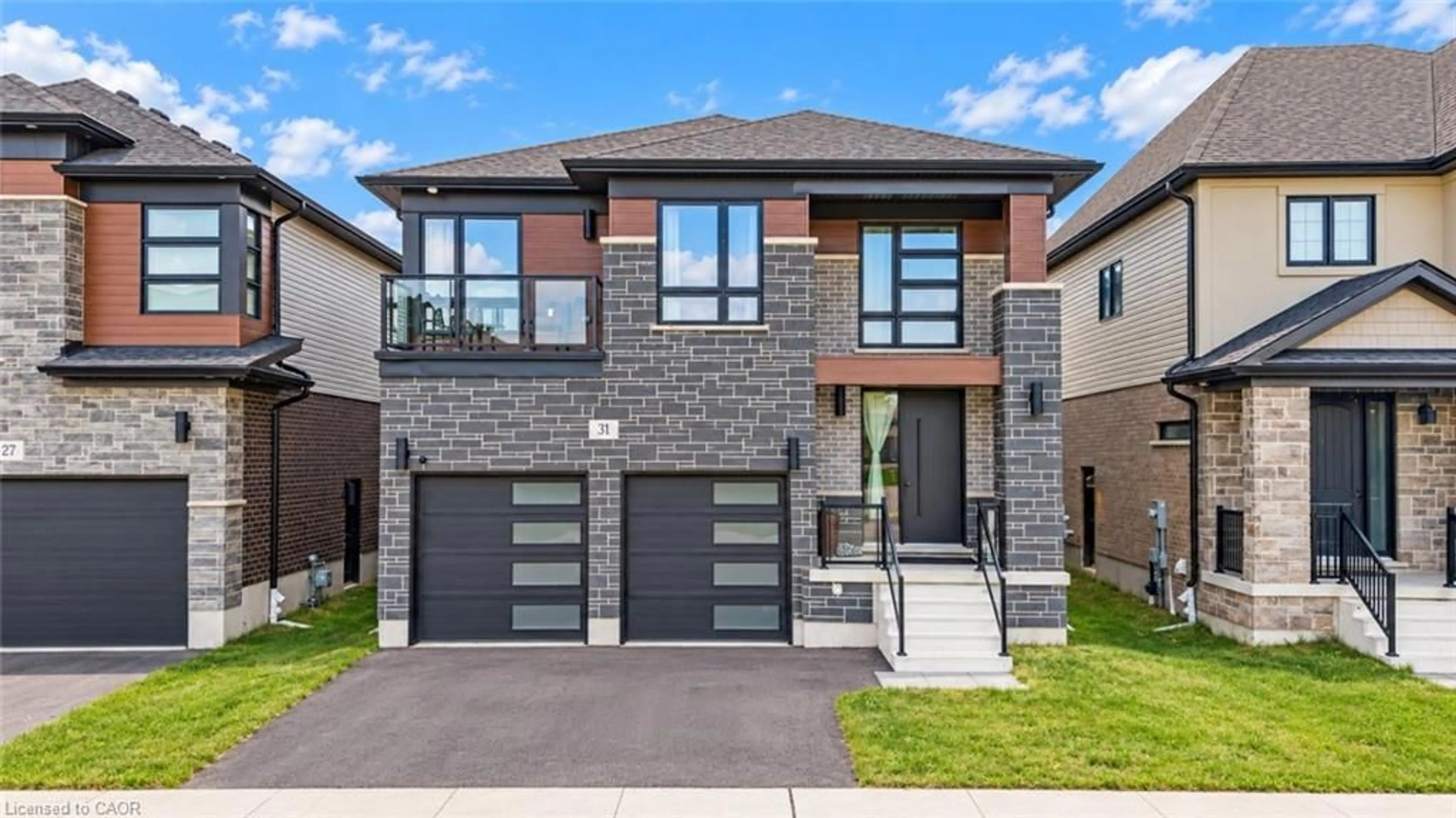Home with brick exterior material, street for 31 Jacob Detweiller Dr, Kitchener Ontario N2P 0K7