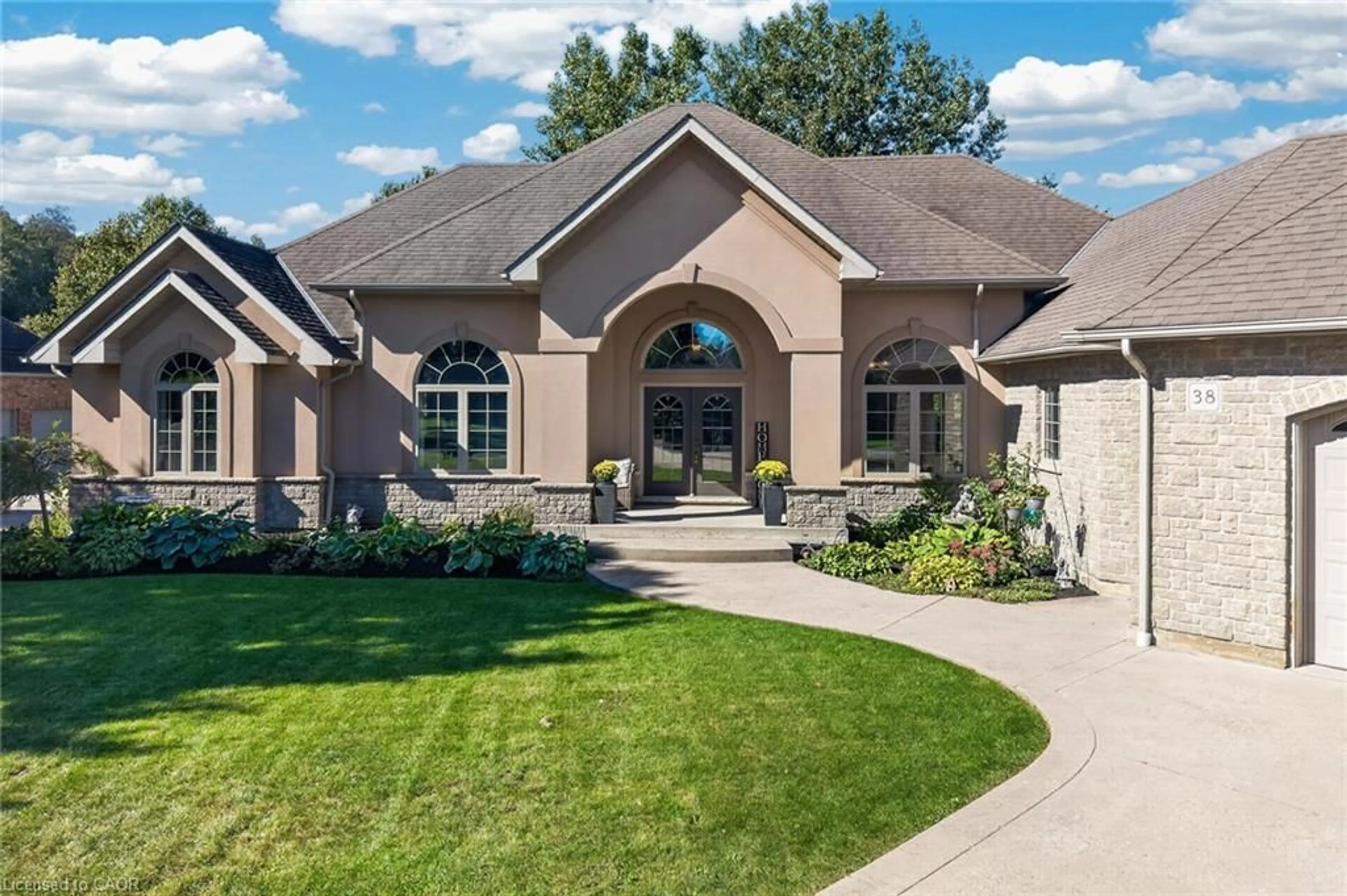 Home with brick exterior material, street for 38 Virginia Ave, Simcoe Ontario N3Y 5M4
