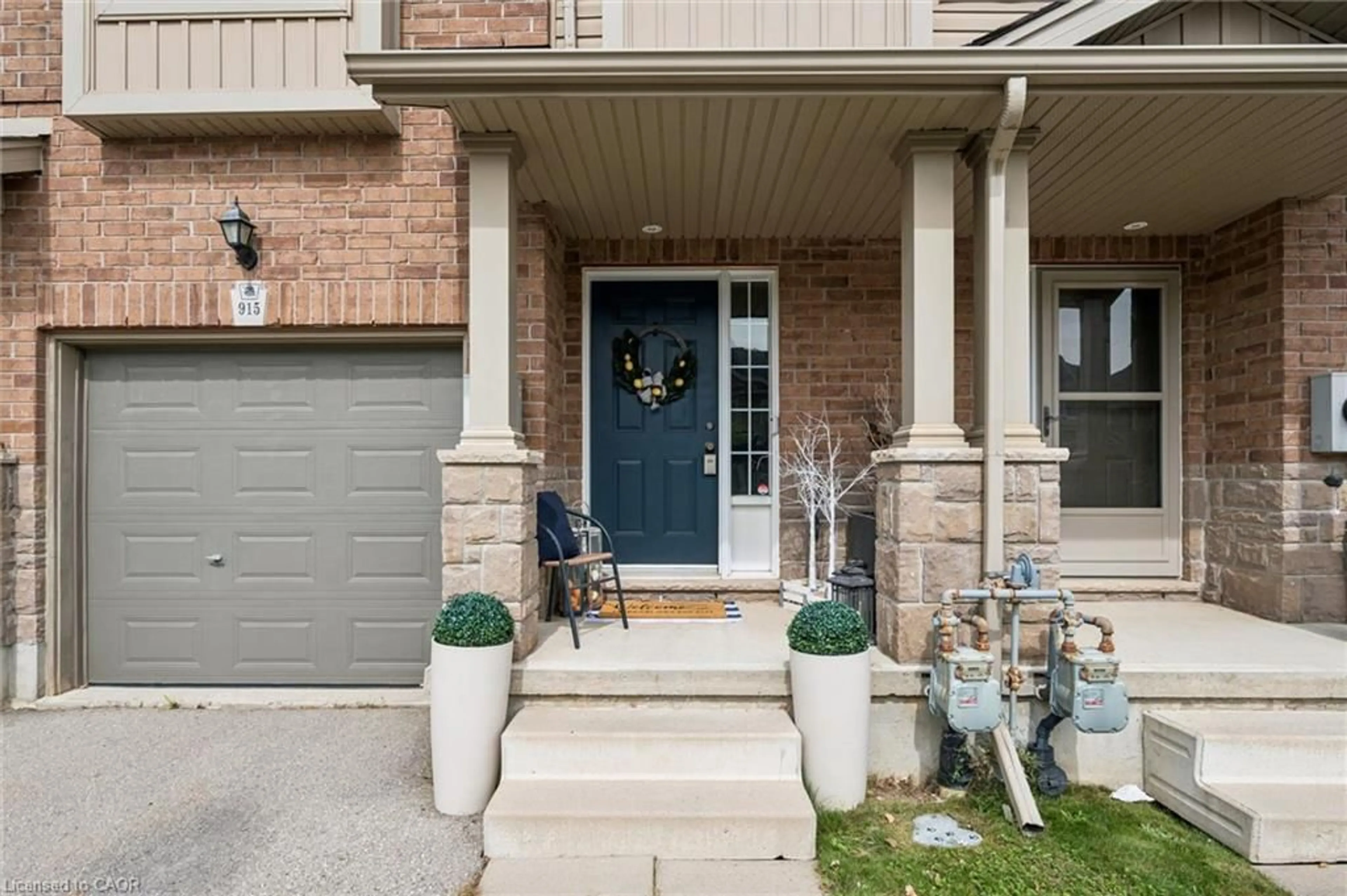 Home with brick exterior material, street for 915 Zeller Cres, Kitchener Ontario N2A 0C7