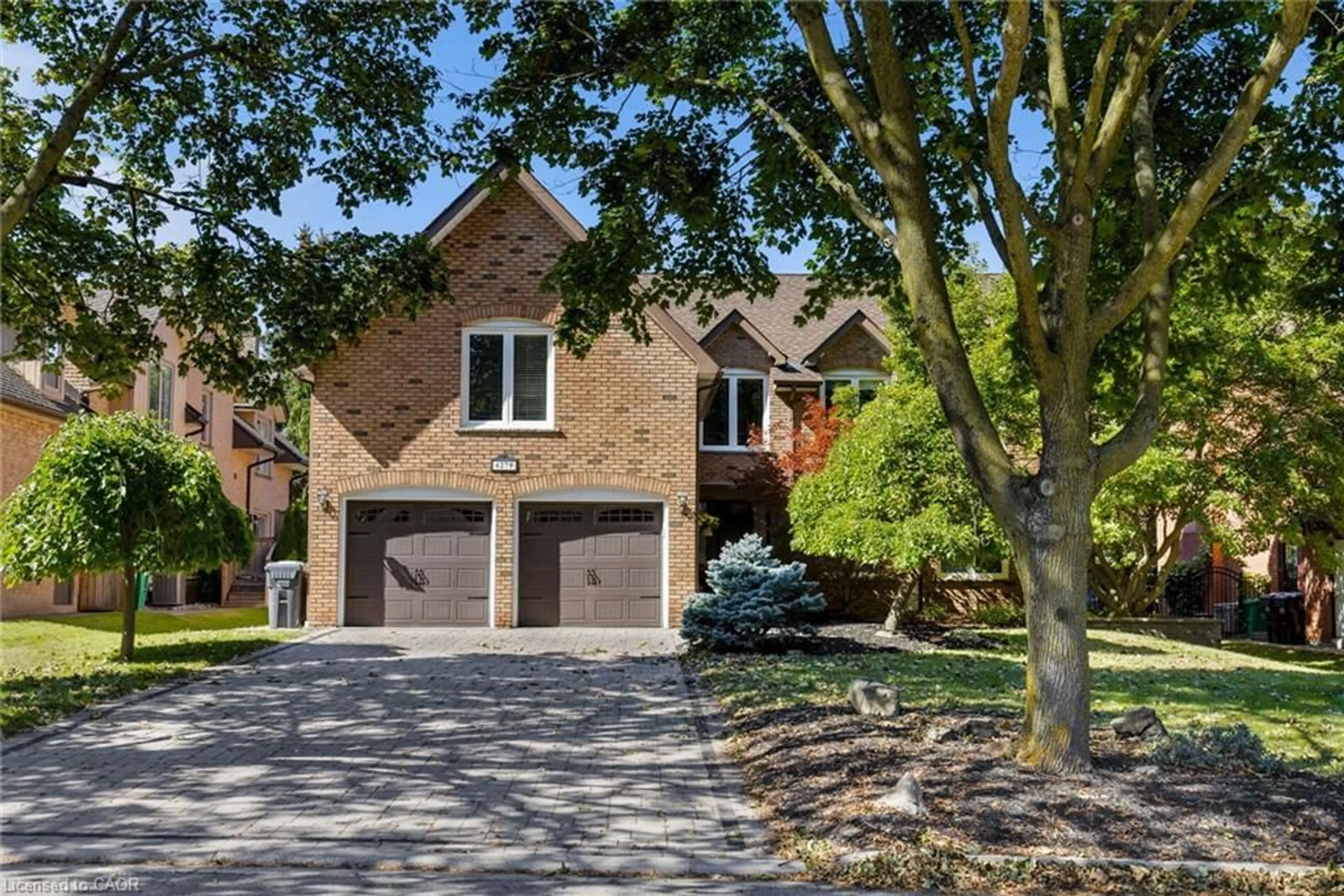 Home with brick exterior material, street for 4279 Bridlepath Trail, Mississauga Ontario L5L 3K3